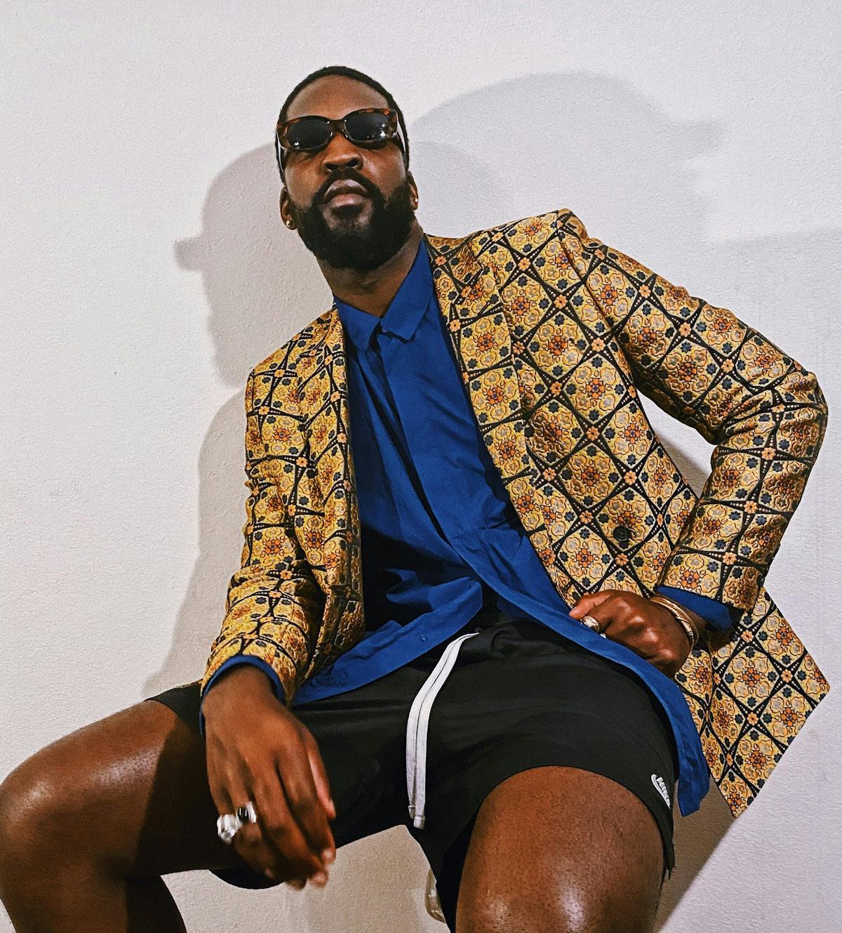 AJ poses for a photograph
