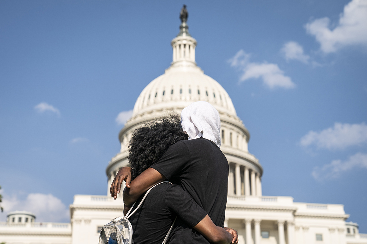 People gather at the U.S. Capitol during a peaceful protest against police brutality