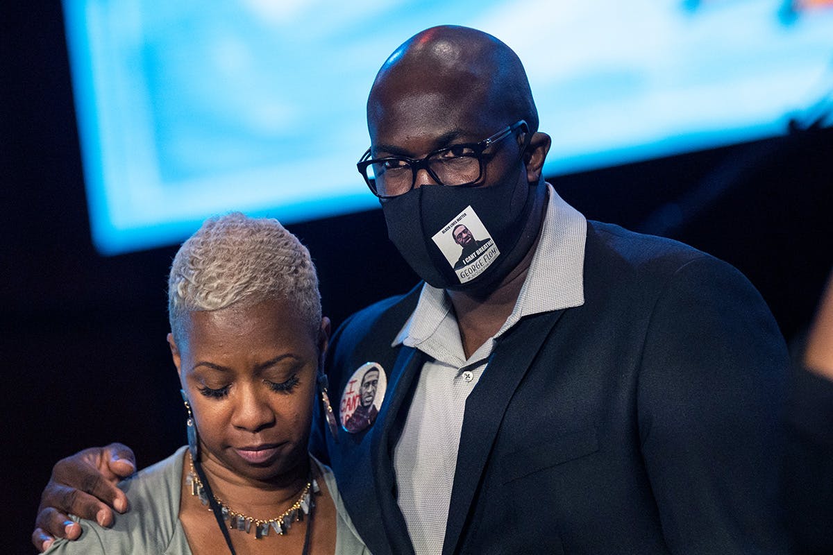 Philonise Floyd, brother of George Floyd, embrace each other during a memorial service