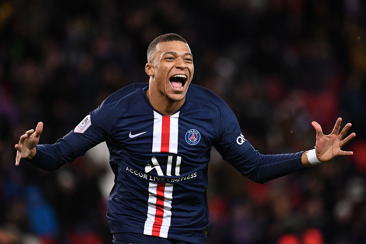 Paris Saint-Germain's French forward Kylian Mbappe celebrates after scoring a goal during the French L1 football match between Paris Saint-Germain (PSG) and Dijon