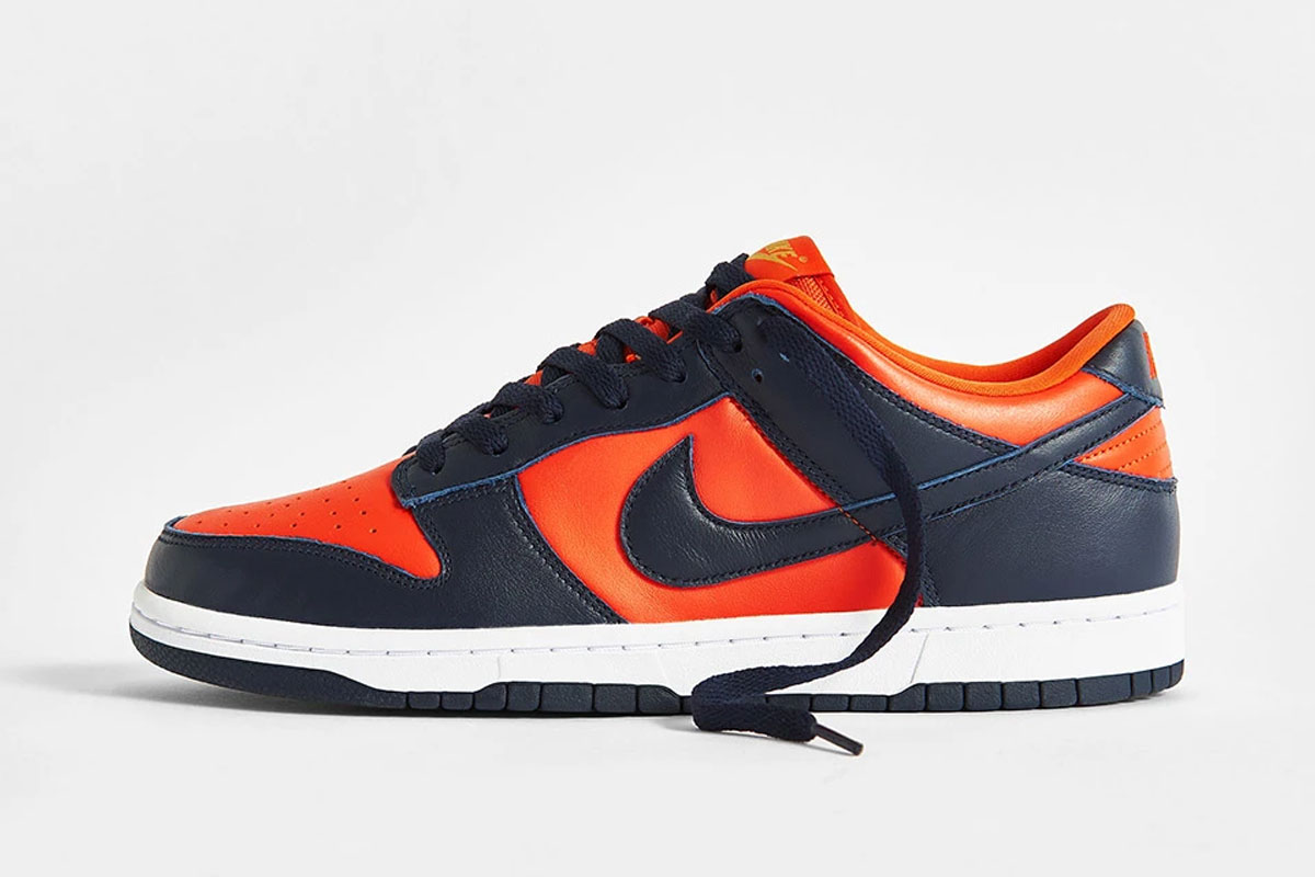navy and orange nike dunk low champ colors product shot