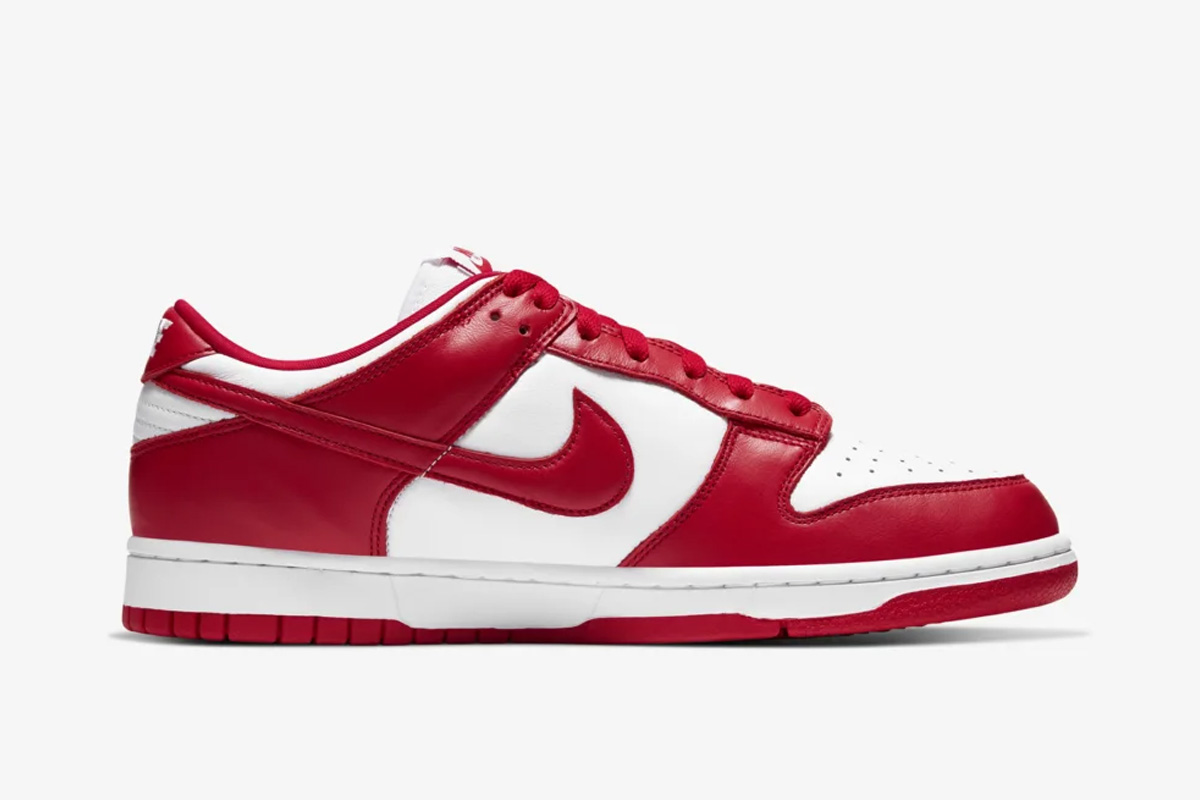Red and white Nike Dunk Low side view