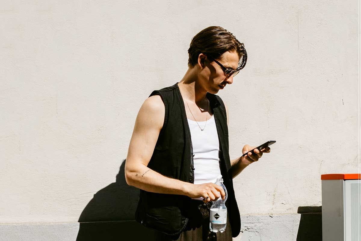 Milan Fashion Week Attendee waits outside shows in January 2020