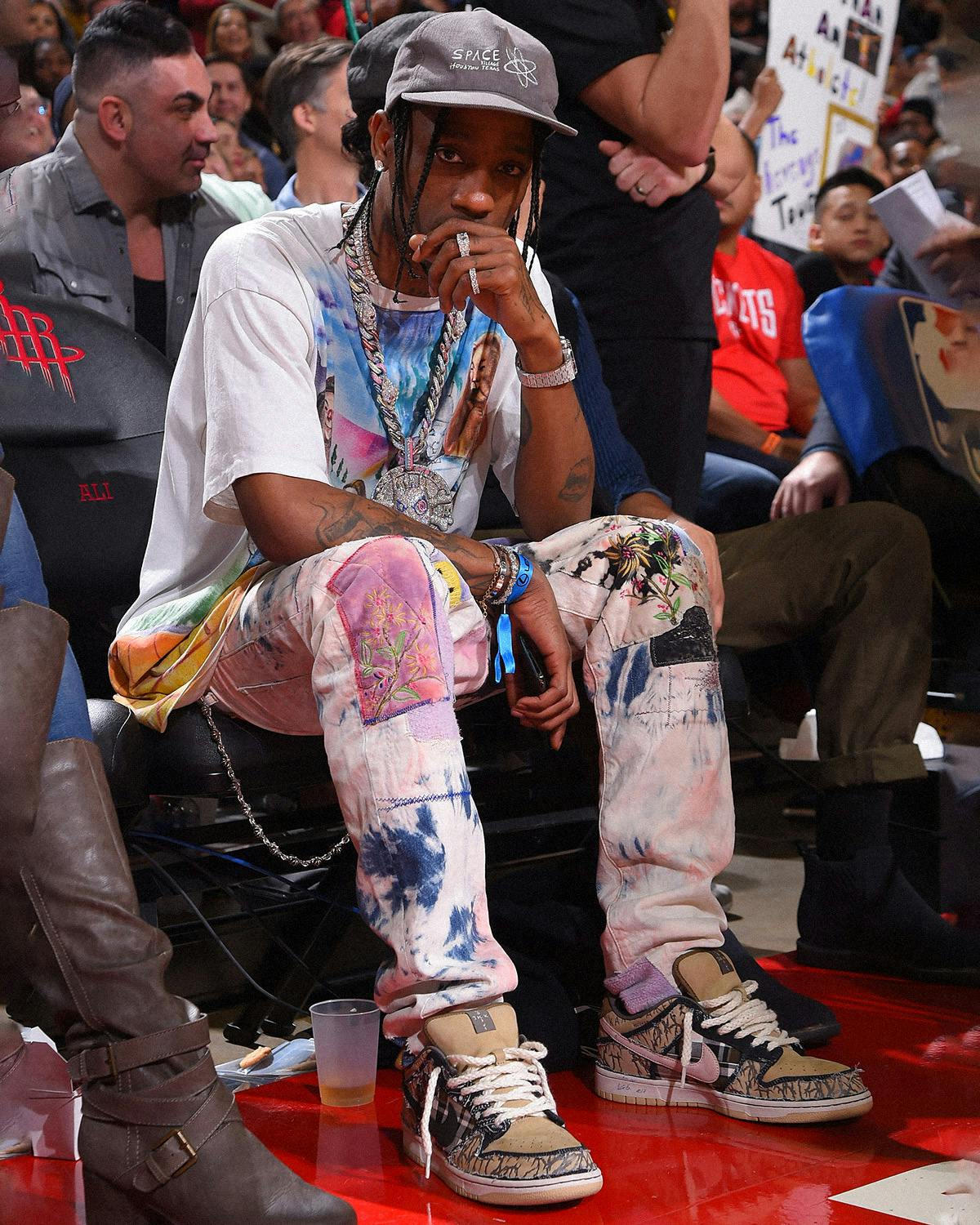 Travis Scott Wears Pharrell's Louis Vuitton With Air Jordan 1s