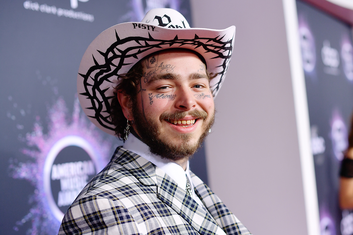 Post Malone smiling tattoos cowboy hat