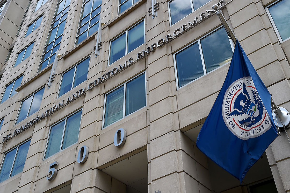 The Department of Homeland Security flag flies outside the Immigration and Customs Enforcement (ICE) headquarters