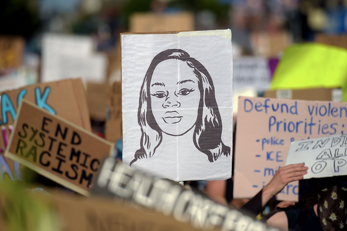 Breonna Taylor sign in protest crowd