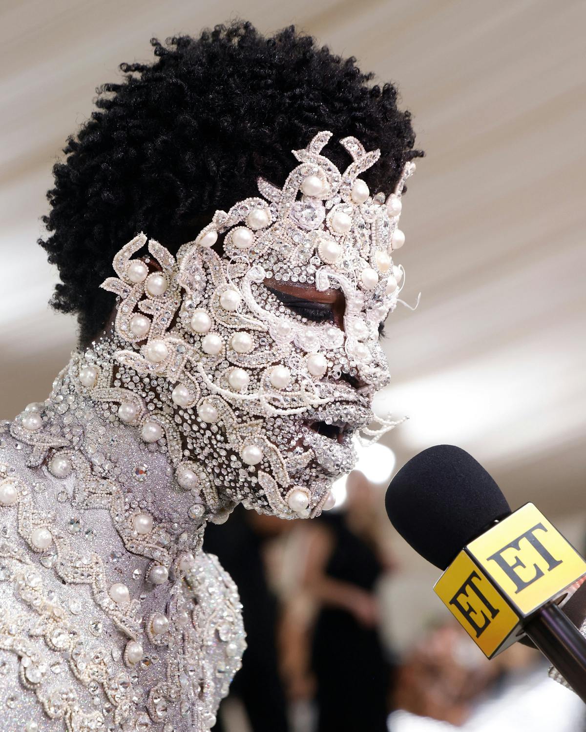 Lil Nas X covers body in silver paint, rhinestones for 2023 Met Gala