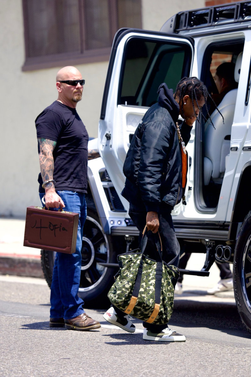 Travis Scott Wears Pharrell's Louis Vuitton With Air Jordan 1s
