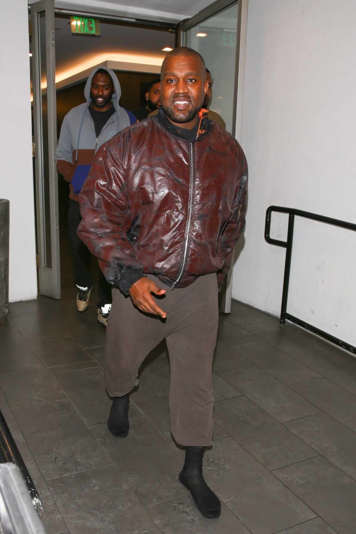 Fabolous in Louis Vuitton Millionaire Jacket and Kanye West Don