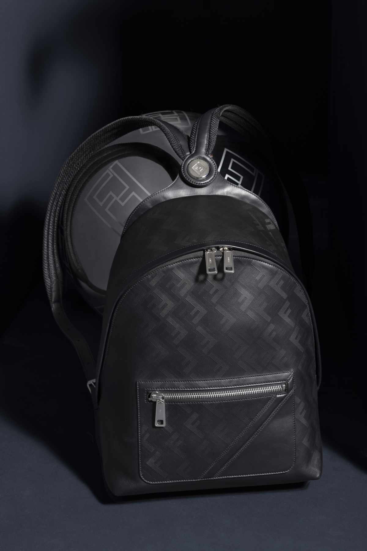 A lifestyle photo of Fendi's Chiodo backpack in black monogram