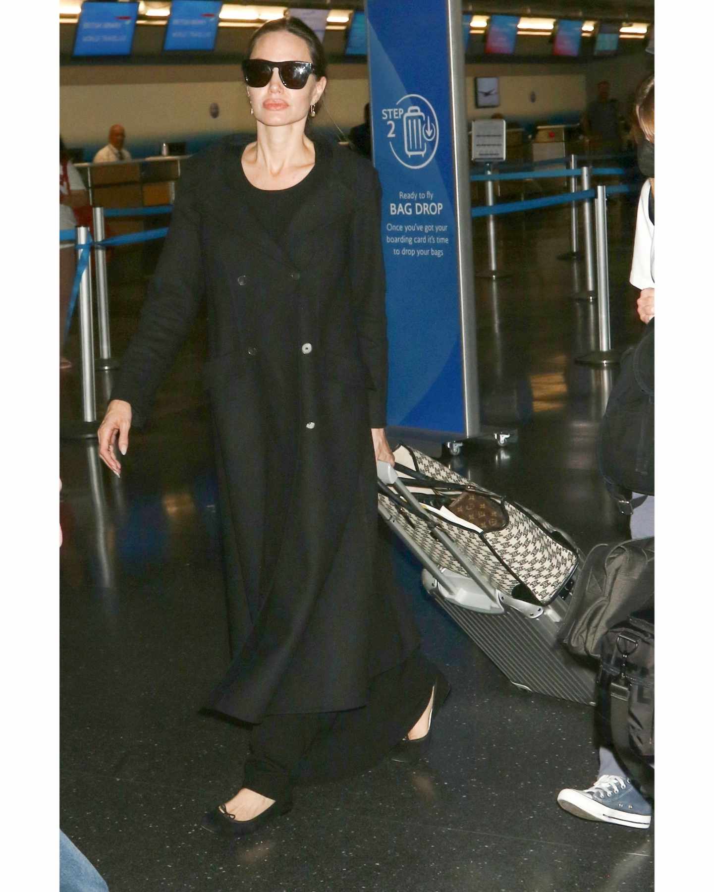 Angelina Jolie Wearing Black Flats