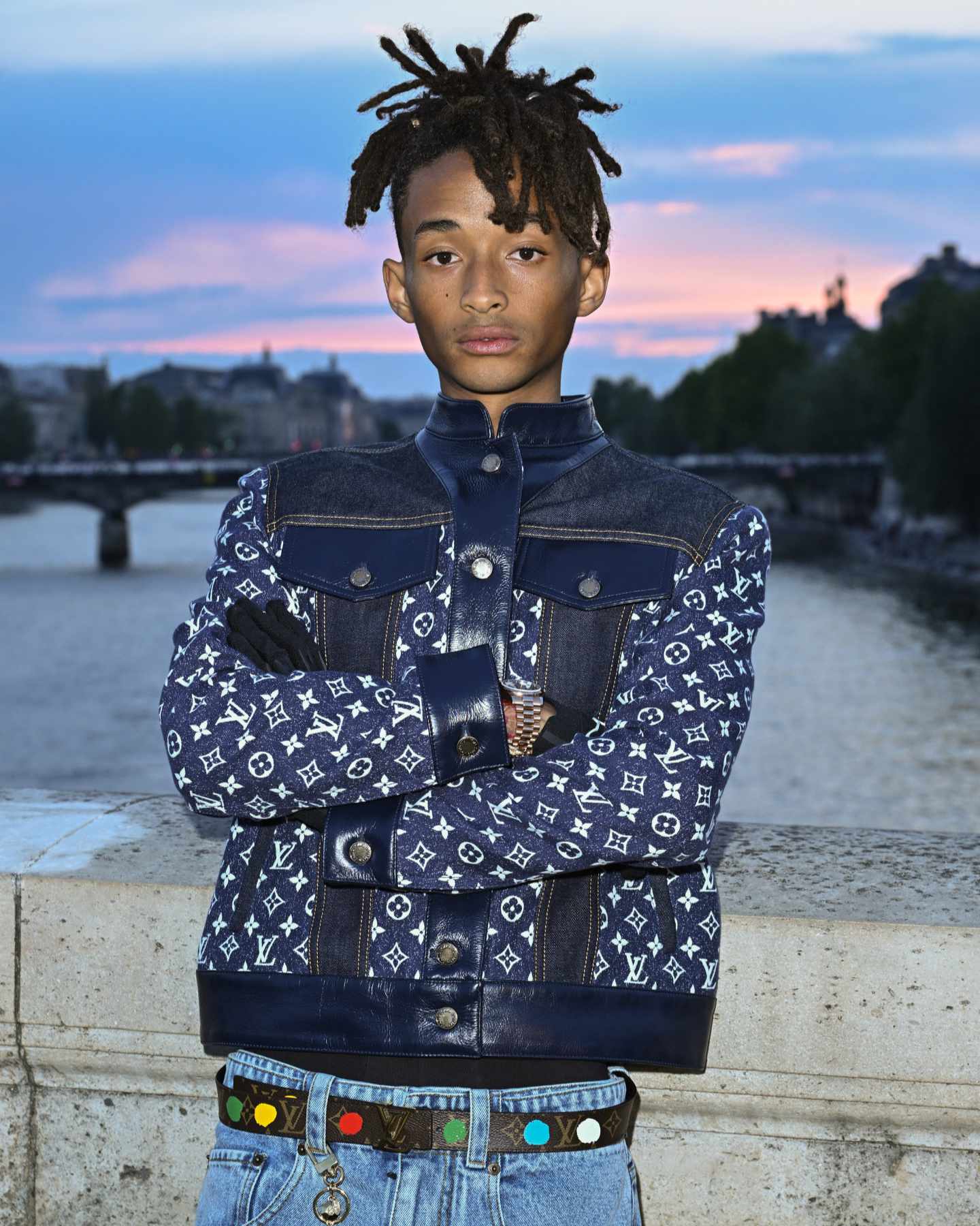 Jaden Smith wears a Louis Vuitton jacket & belt at Pharrell's debut runway show in June 2023
