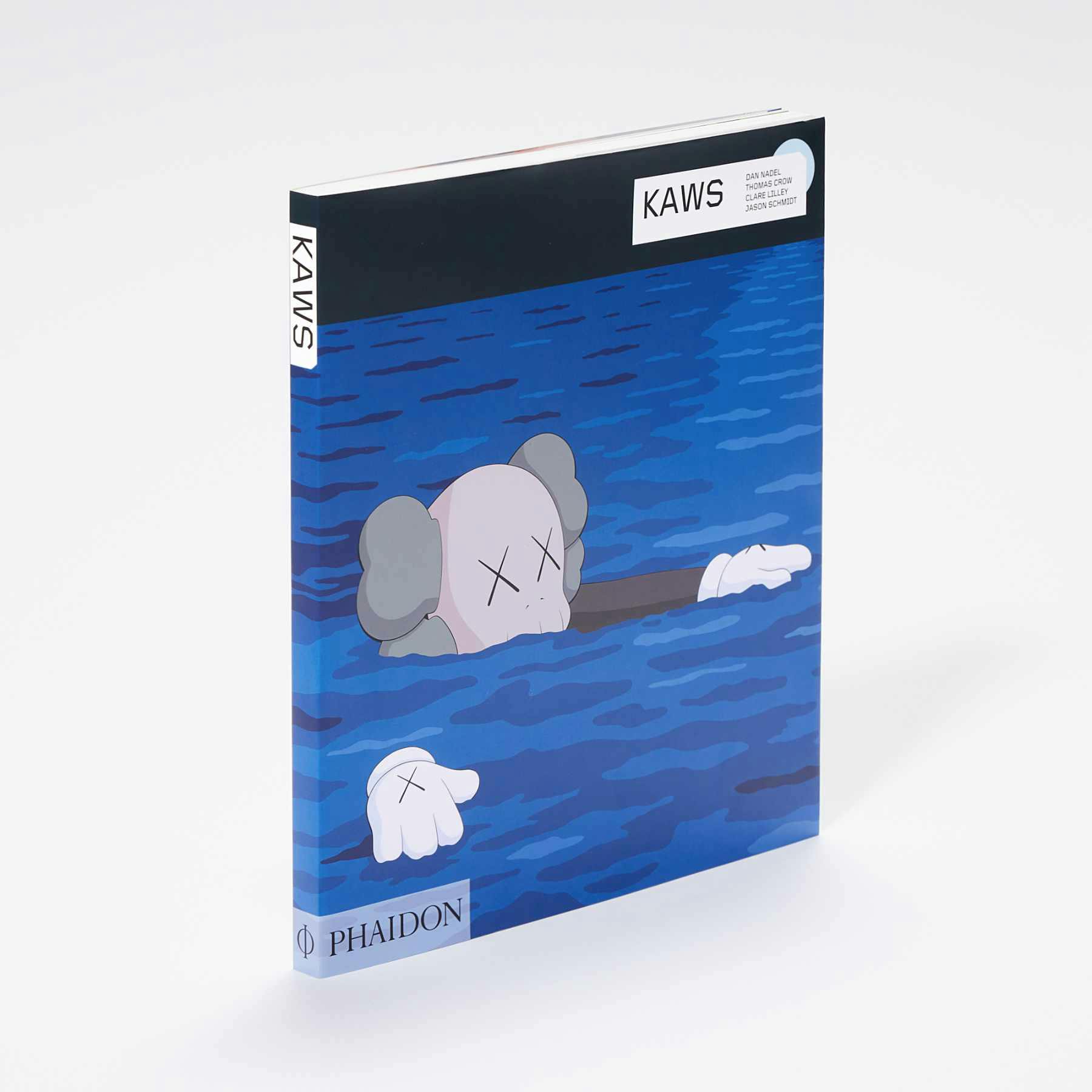 A detailed photograph of the KAWS 'What Party' book published by Phaidon