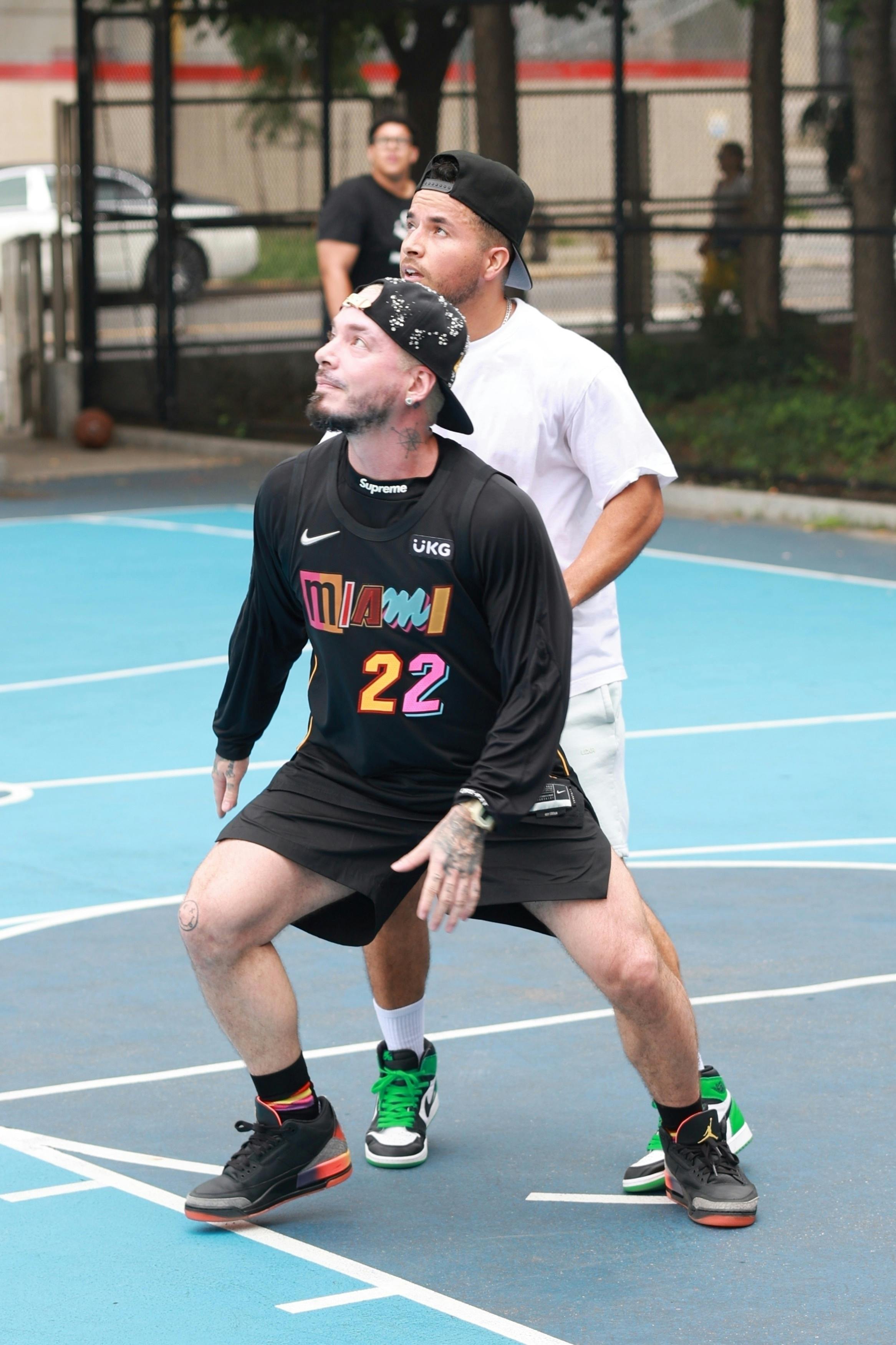 J.Balvin wears his unreleased Air Jordan 3 "Rio" shoes while playing basketball in New York with Jimmy Butler