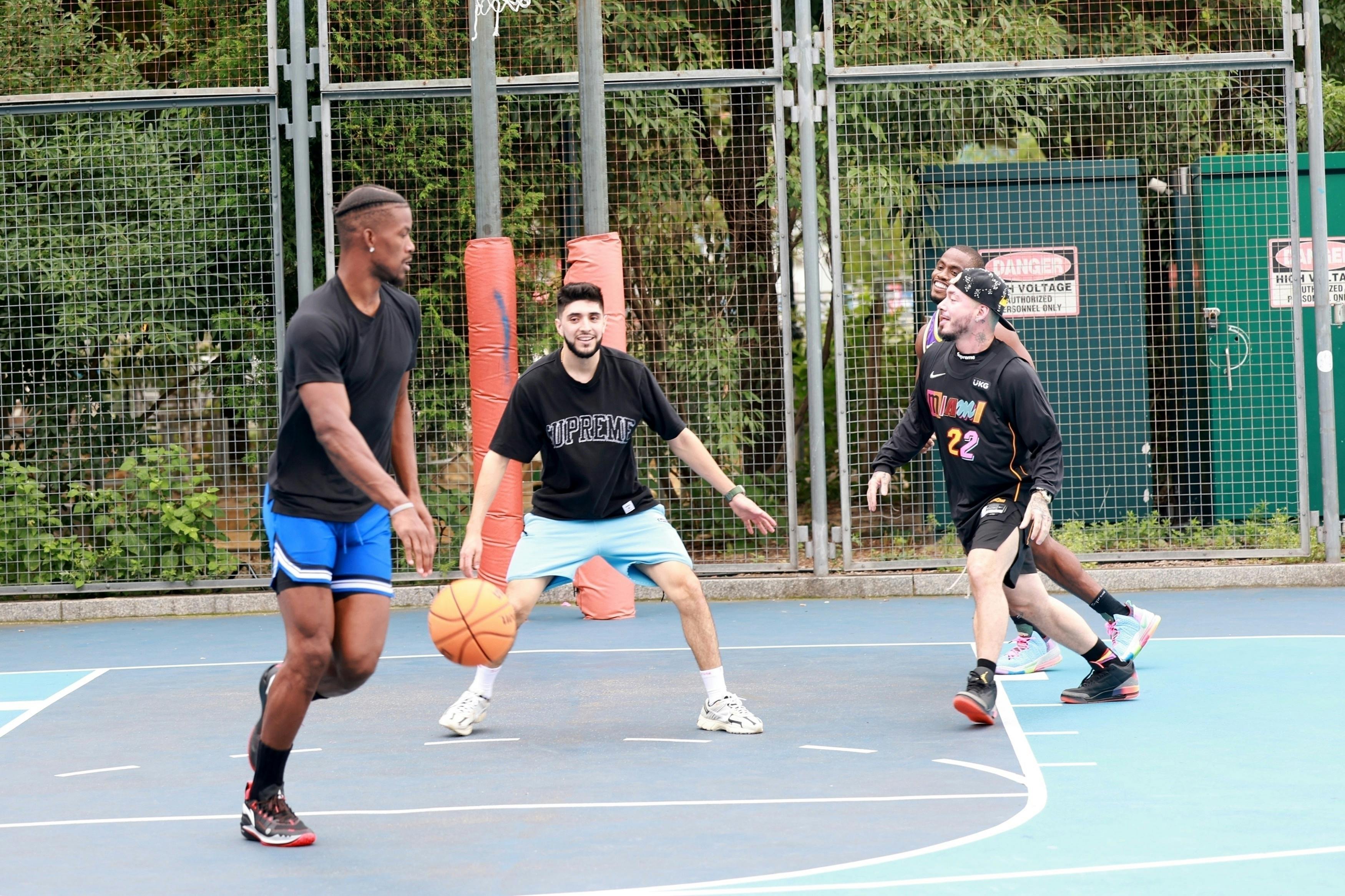 J.Balvin wears his unreleased Air Jordan 3 "Rio" shoes while playing basketball in New York with Jimmy Butler