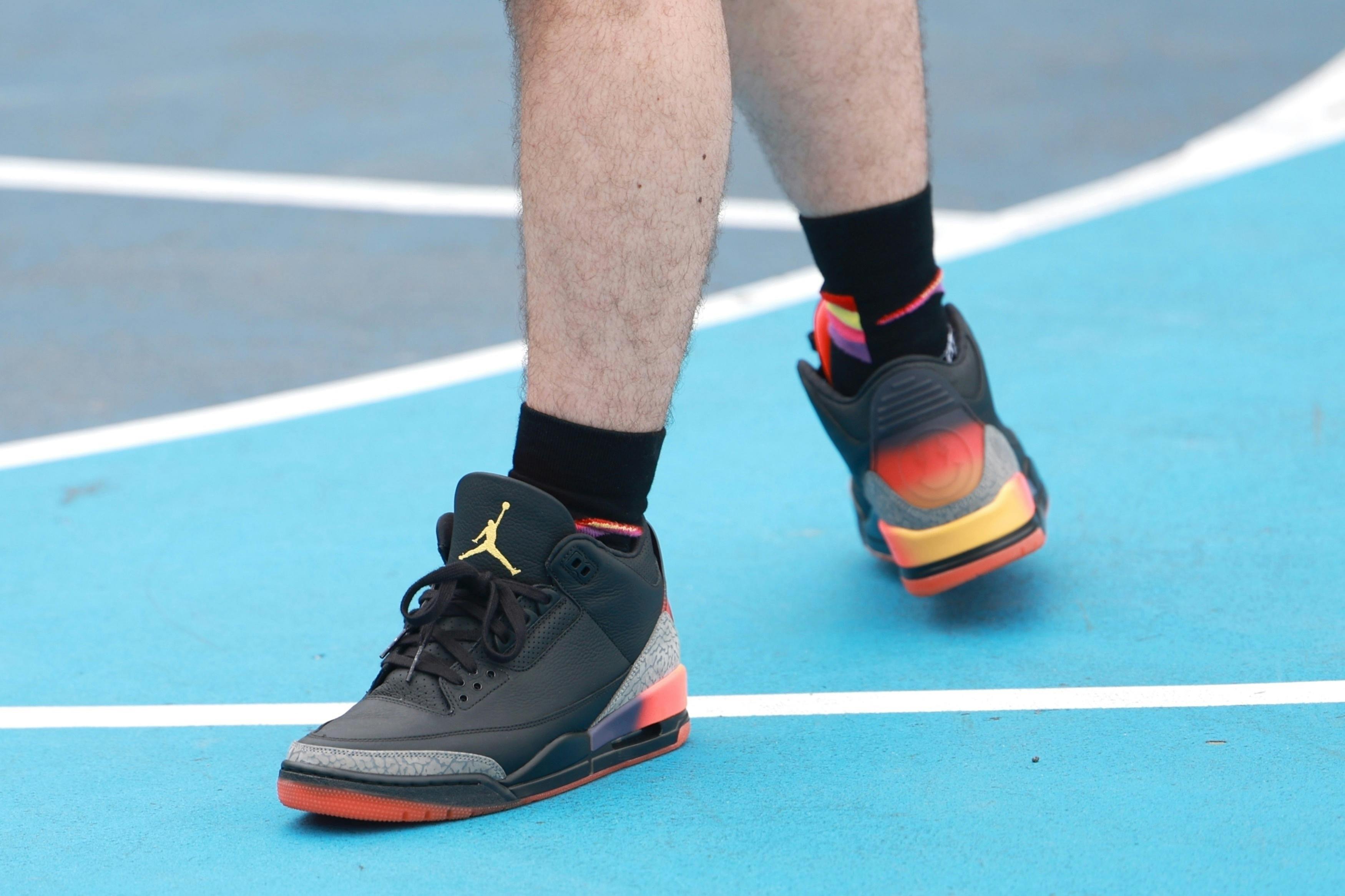 J.Balvin wears his unreleased Air Jordan 3 "Rio" shoes while playing basketball in New York with Jimmy Butler