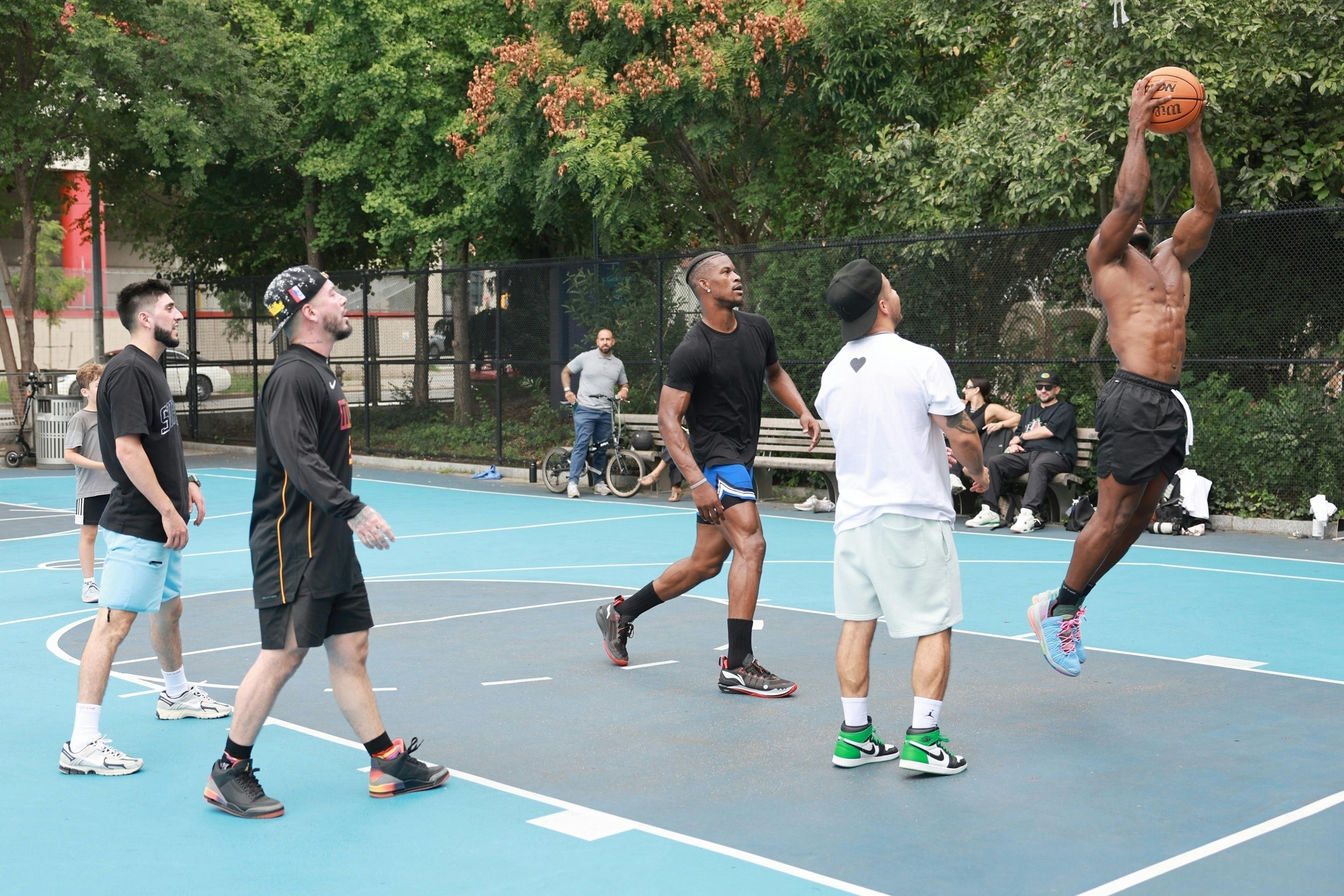 J.Balvin wears his unreleased Air Jordan 3 "Rio" shoes while playing basketball in New York with Jimmy Butler