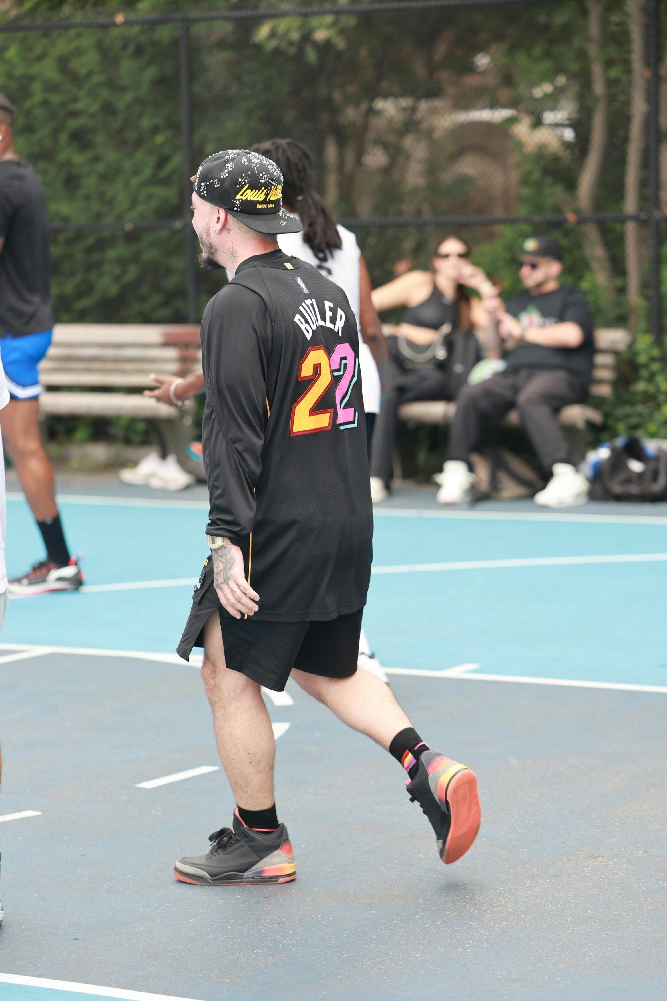 J.Balvin wears his unreleased Air Jordan 3 "Rio" shoes while playing basketball in New York with Jimmy Butler