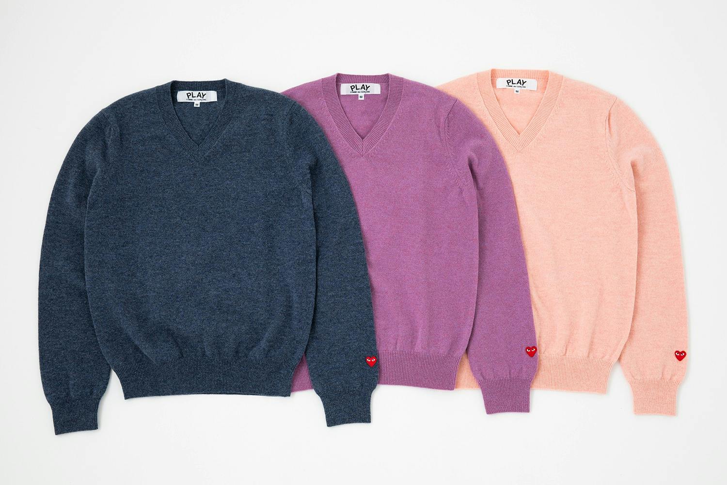 CDG Play's Fall/Winter 2023 heart logo sweater collection, including crewneck pullovers & cardigans