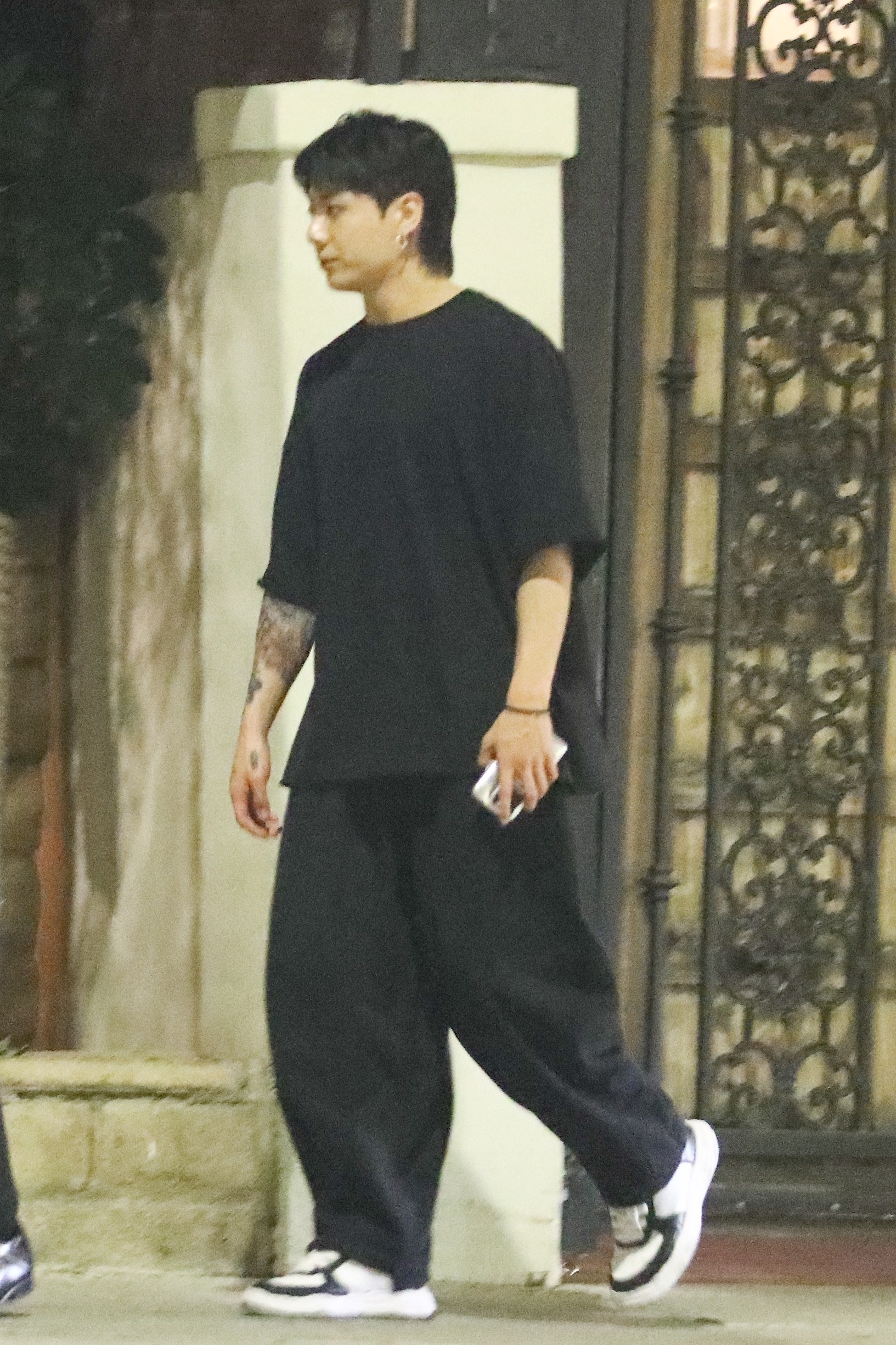 BTS member Jungkook wears an all-black outfit and Maison Mihara Yasuhiro sneakers out in Los Angeles on September 6