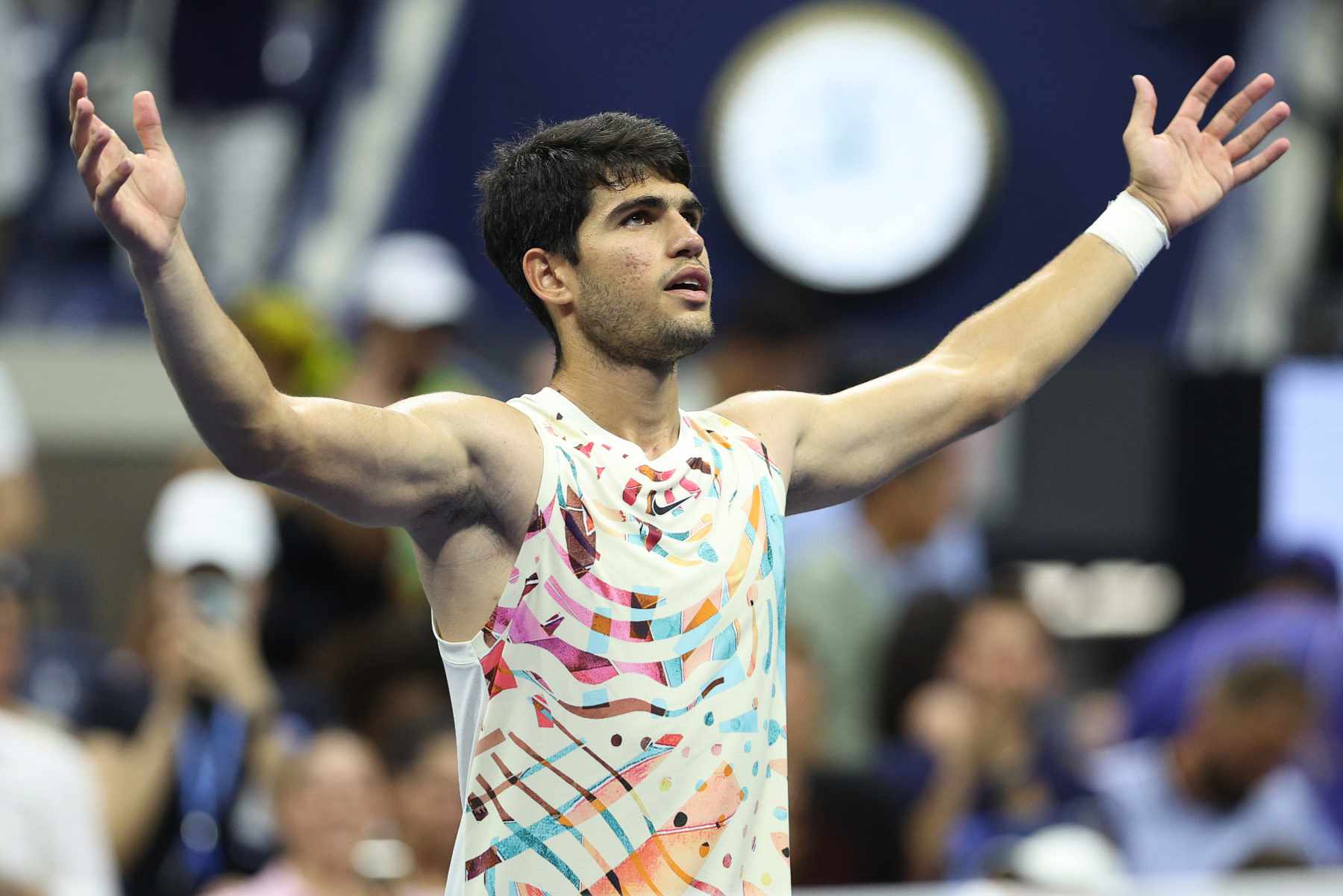 Carlos Alcaraz wears a sleeveless T-shirt during a tennis match at the 2023 US Open