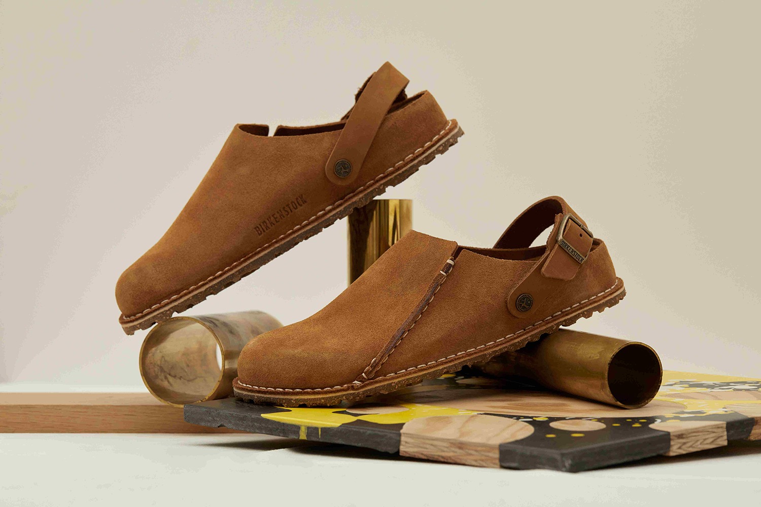 A photo of Birkenstock's new Lutry clog in brown or black suede