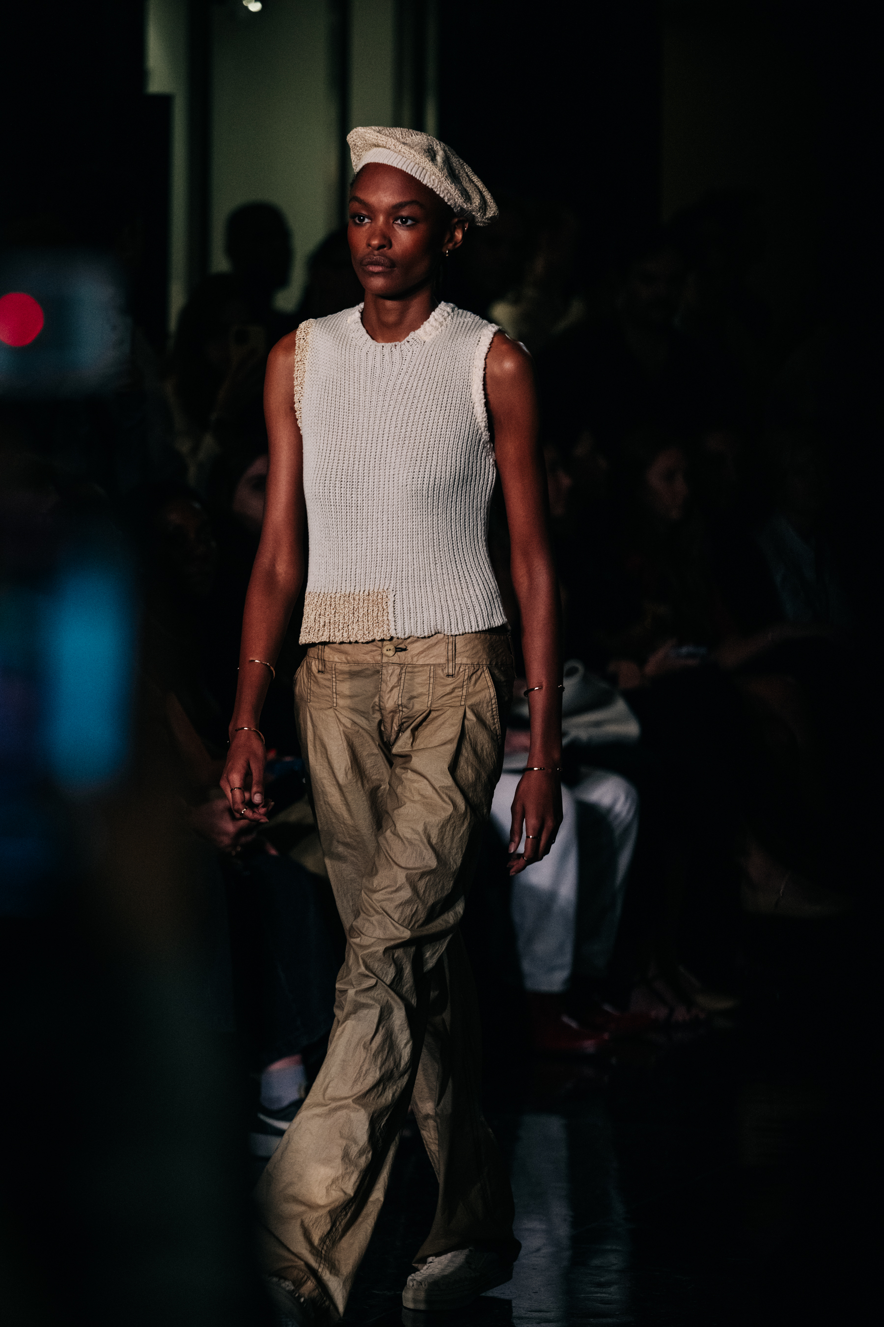 Models wear clothes from Eckhaus Latta's Spring/Summer 2024 runway show
