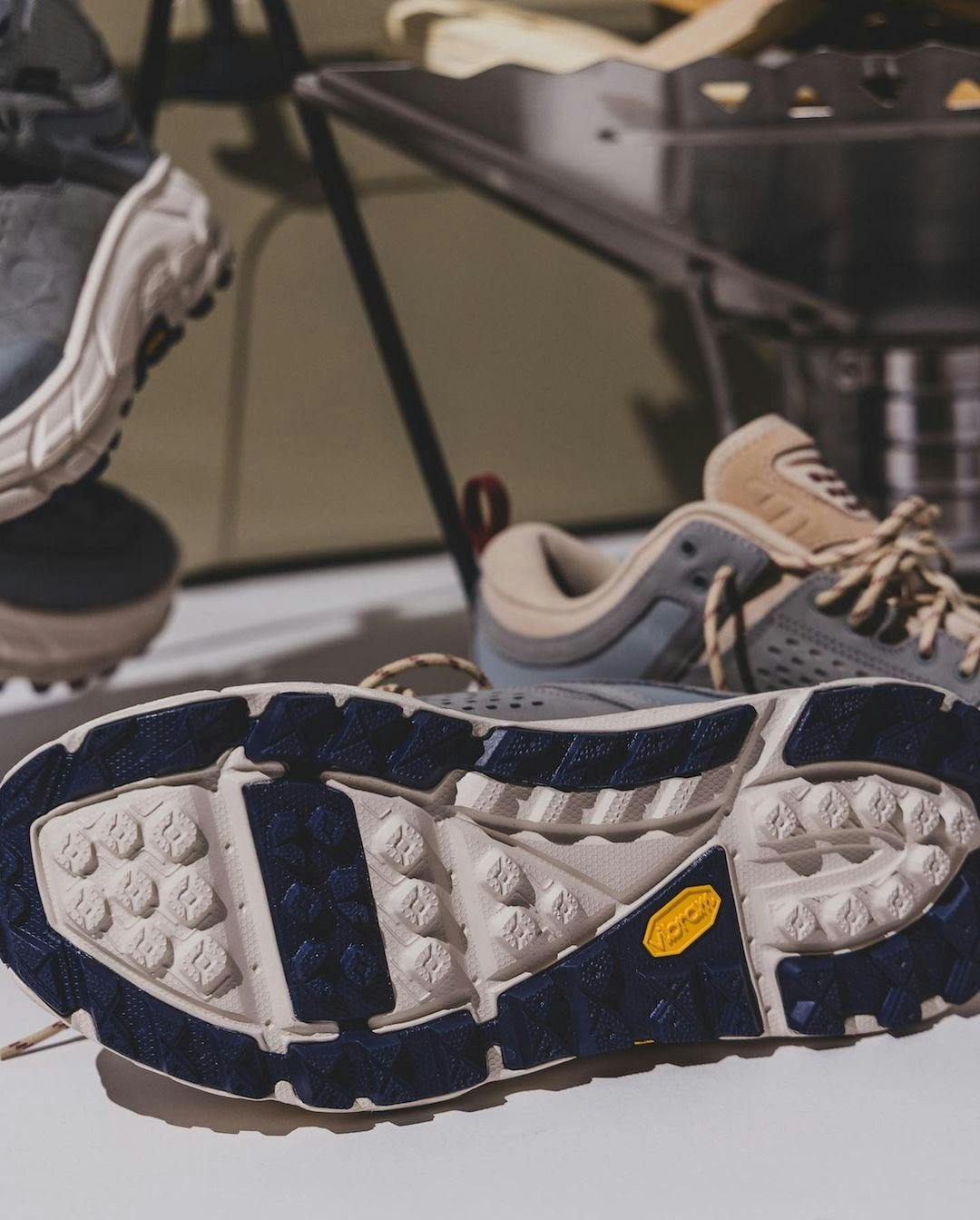 Stylized photographs of BEAMS' HOKA Tor Ultra Low & Hi Fall/Winter 2023 sneaker collaborations