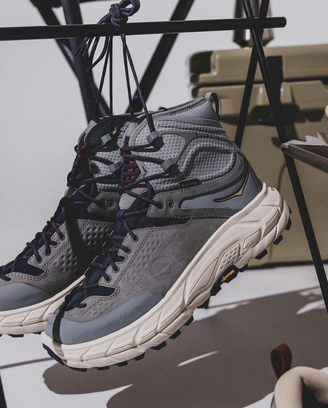 Stylized photographs of BEAMS' HOKA Tor Ultra Low & Hi Fall/Winter 2023 sneaker collaborations