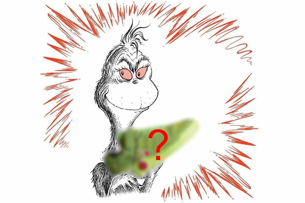 The Grinch holds a pair of green adidas Forum sneakers