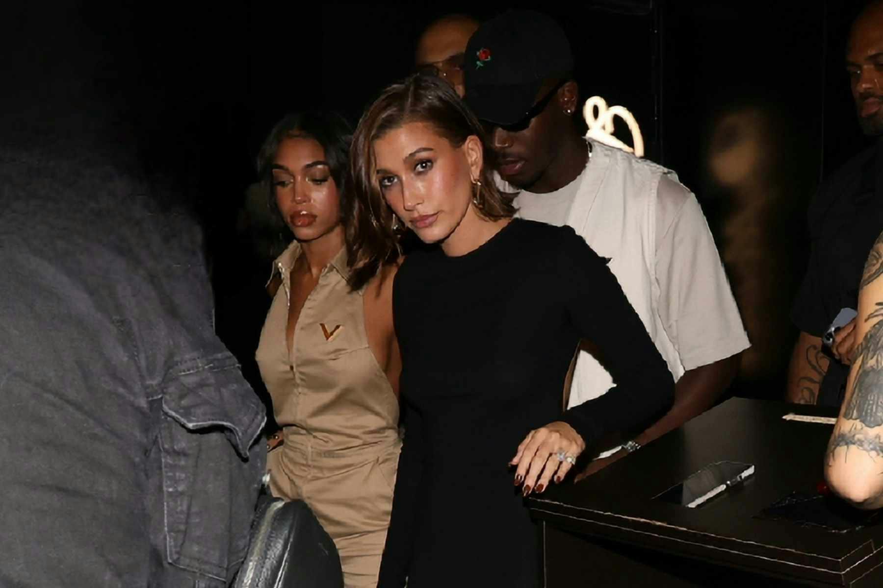 Hailey Bieber wears a Saint Laurent dress after the SS24 runway show in Paris