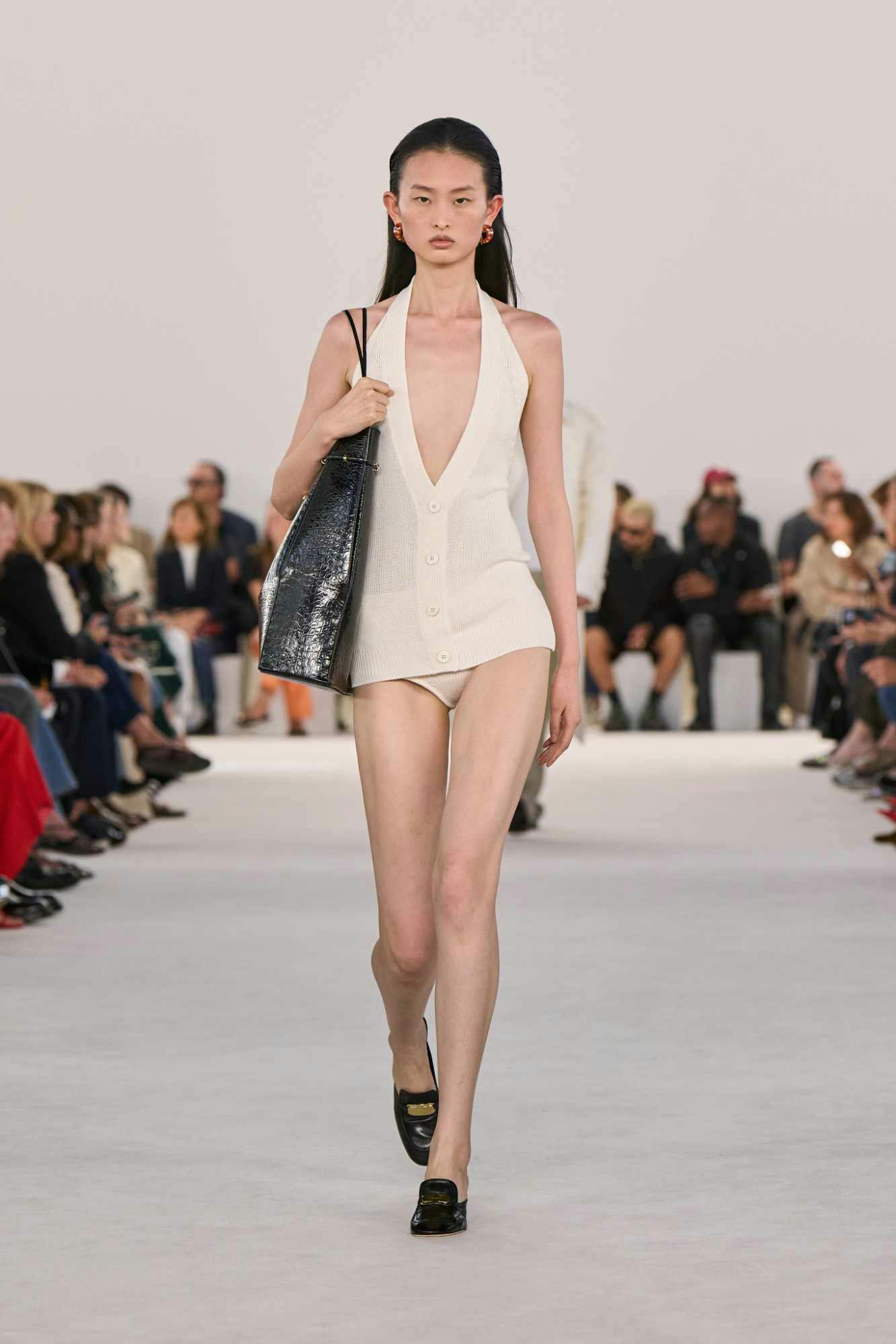 Models wear Ferragamo's SS24 collection