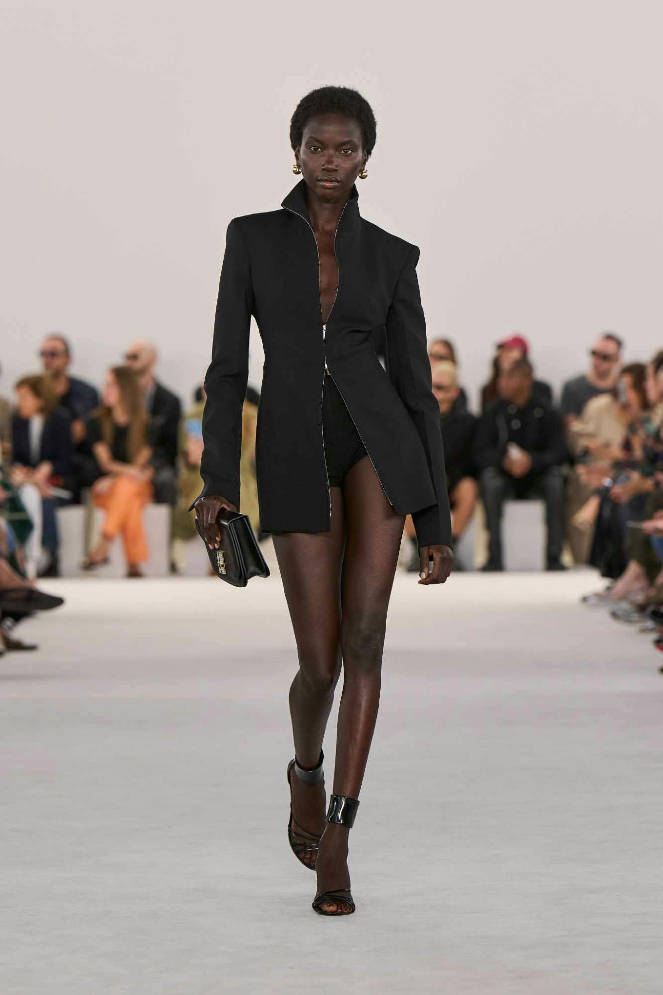 Models wear Ferragamo's SS24 collection