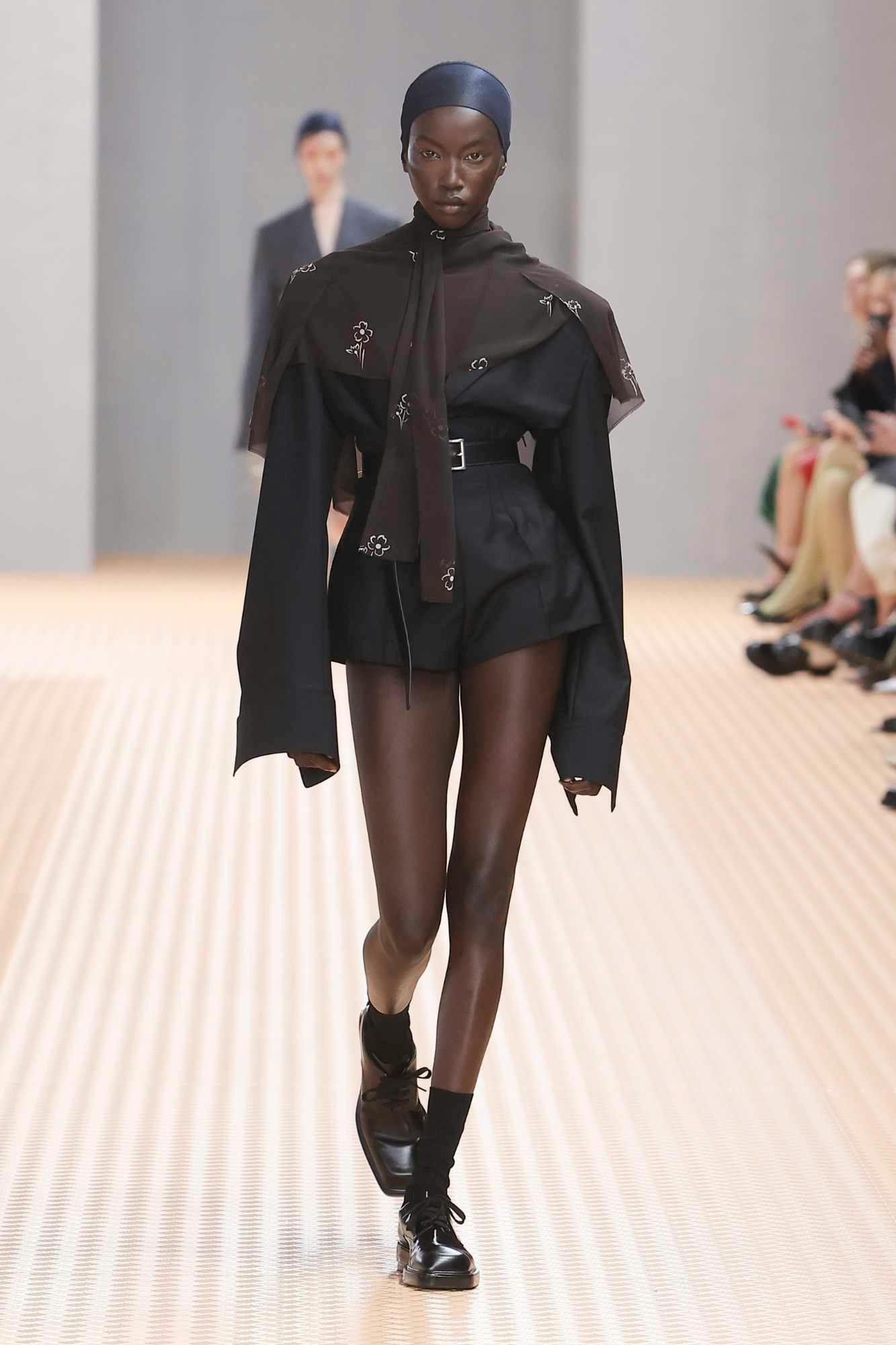 Models wear Prada's SS24 womenswear collection