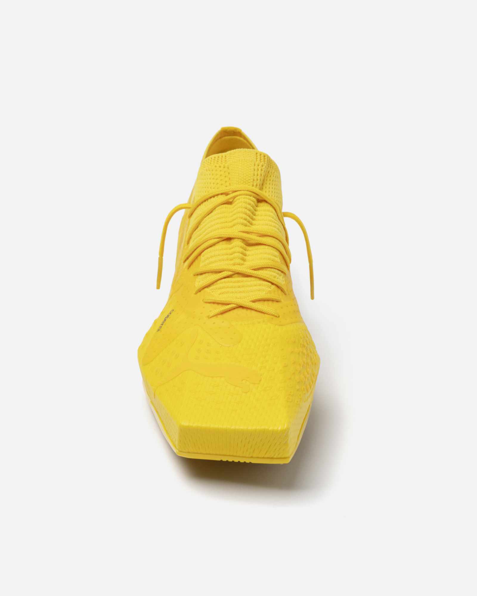 Product photos of Coperni & PUMA's collaborative sneaker in black, white and yellow colorways