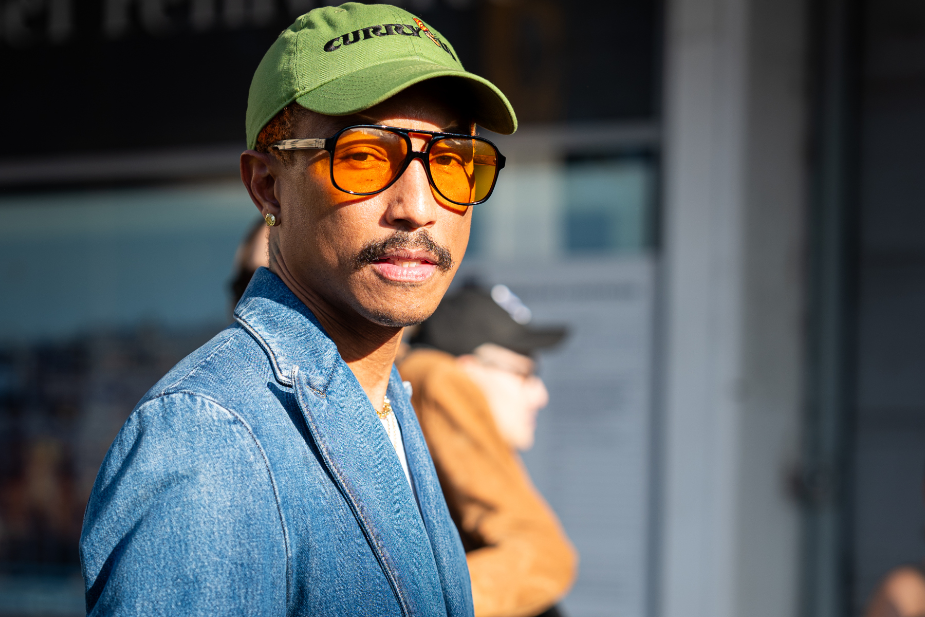 Pharrell Williams is seen outside Sacai fashion show during the Womenswear Spring/Summer 2024 as part of Paris Fashion Week.