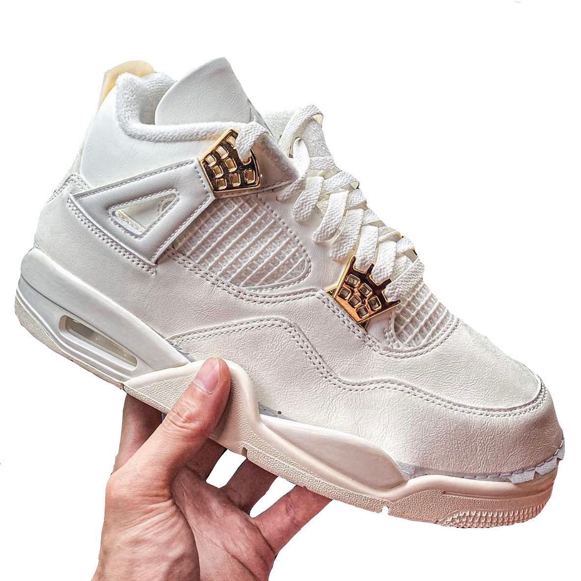 A New (Gilded) Air Jordan 4 Sail Releases Spring 2024