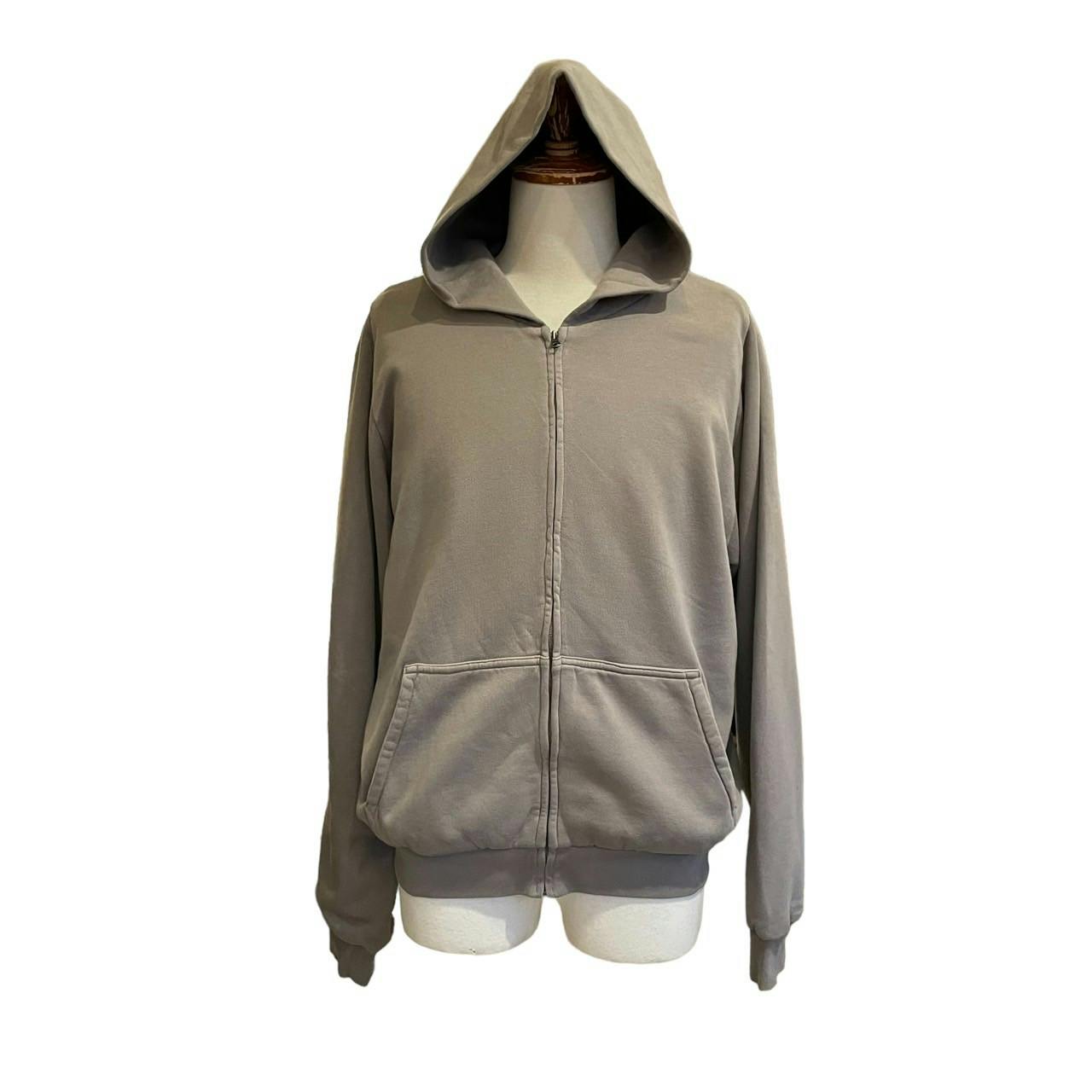 Photos of YEEZY GAP zip-up hoodies sold by What'z Up Harajuku