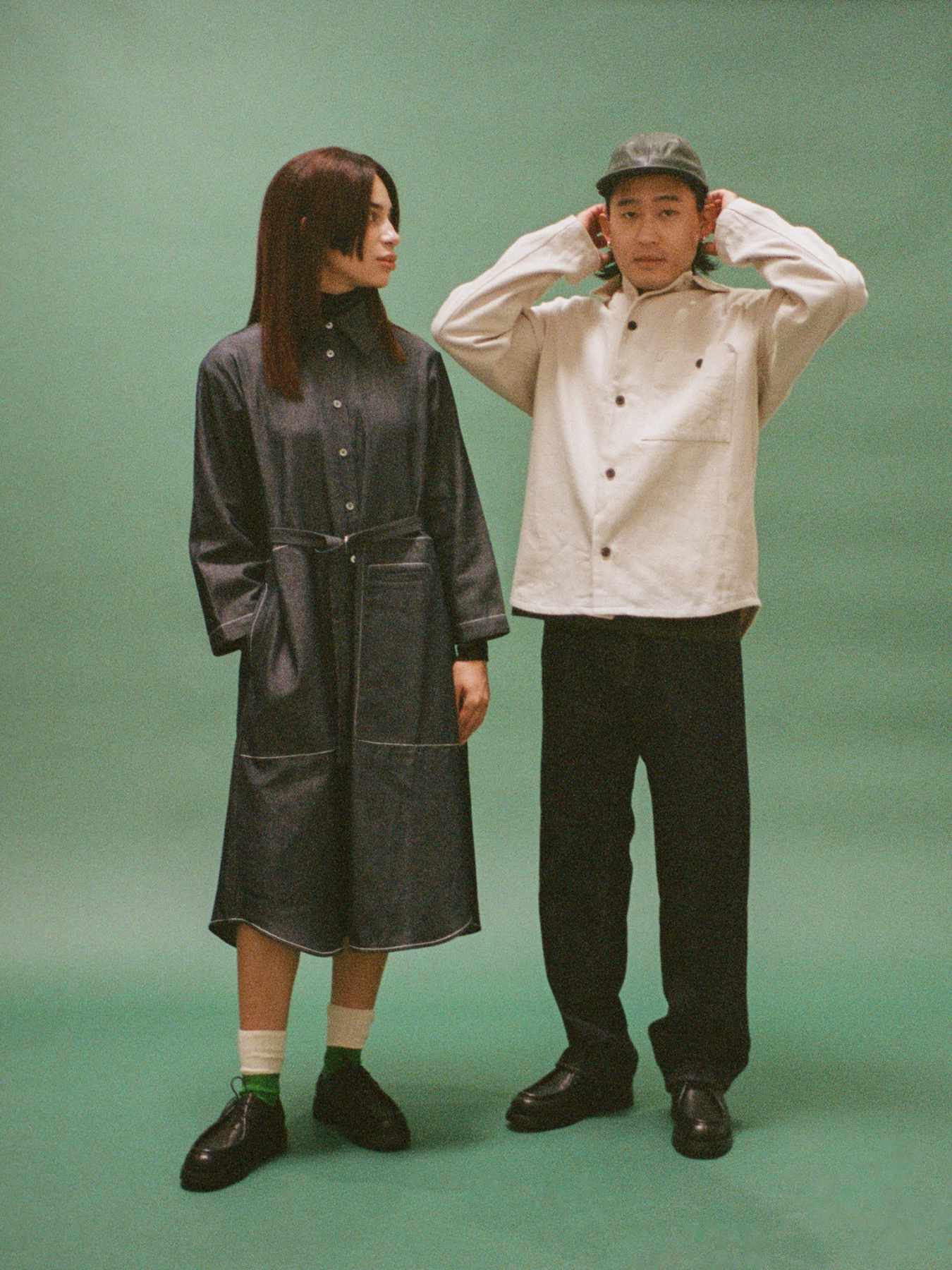 Models wear Namu Shop's Fall/Winter 2023 clothing collections in a green-themed editorial