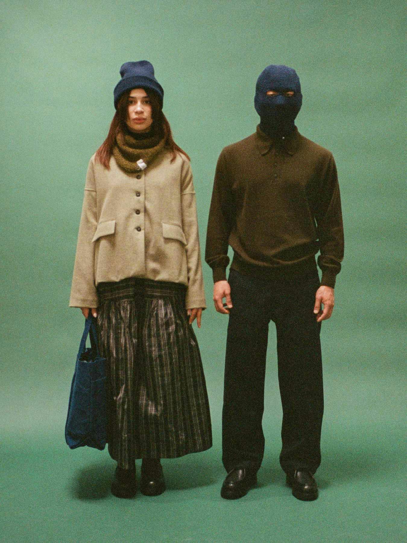 Models wear Namu Shop's Fall/Winter 2023 clothing collections in a green-themed editorial