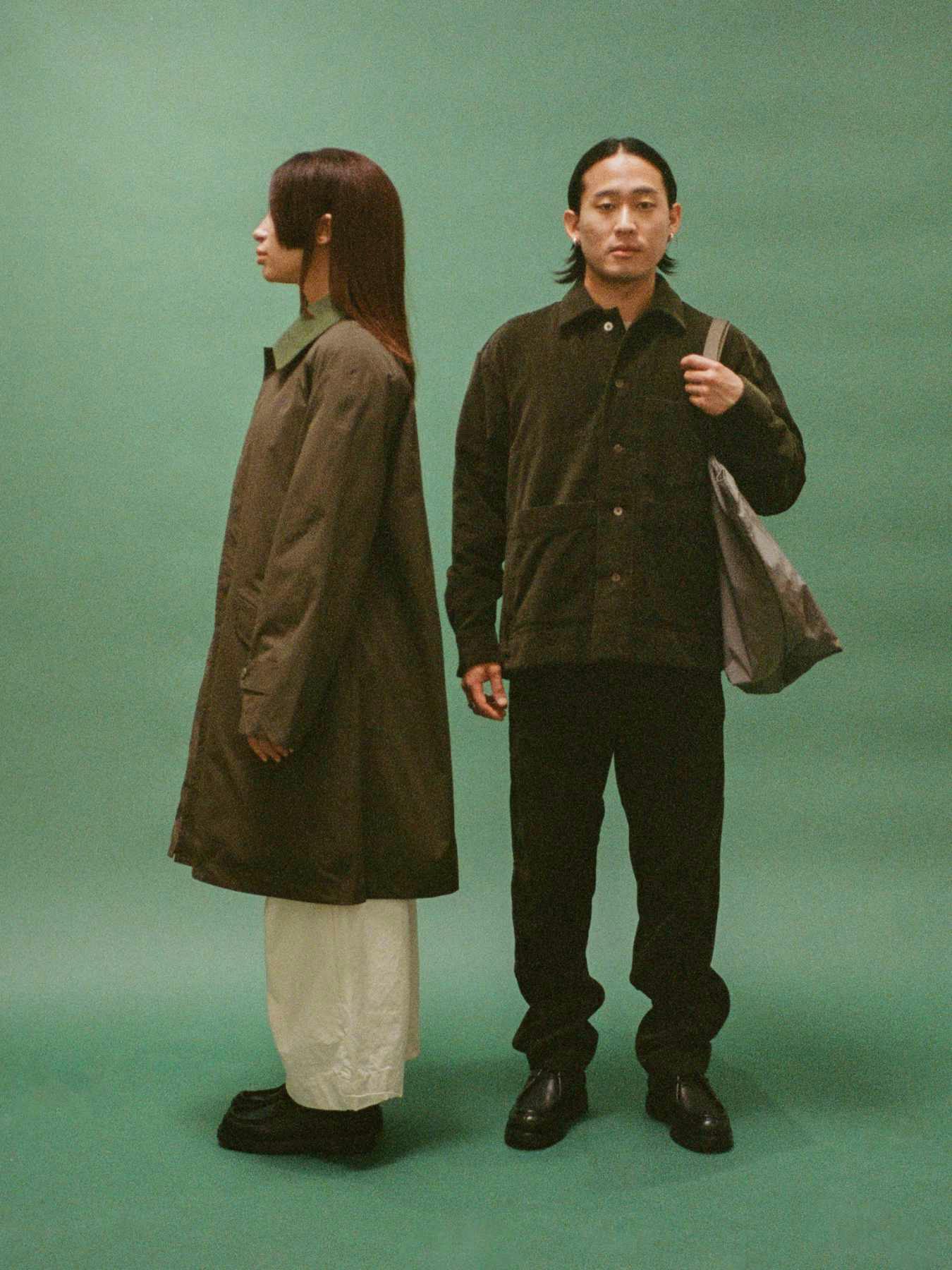 Models wear Namu Shop's Fall/Winter 2023 clothing collections in a green-themed editorial