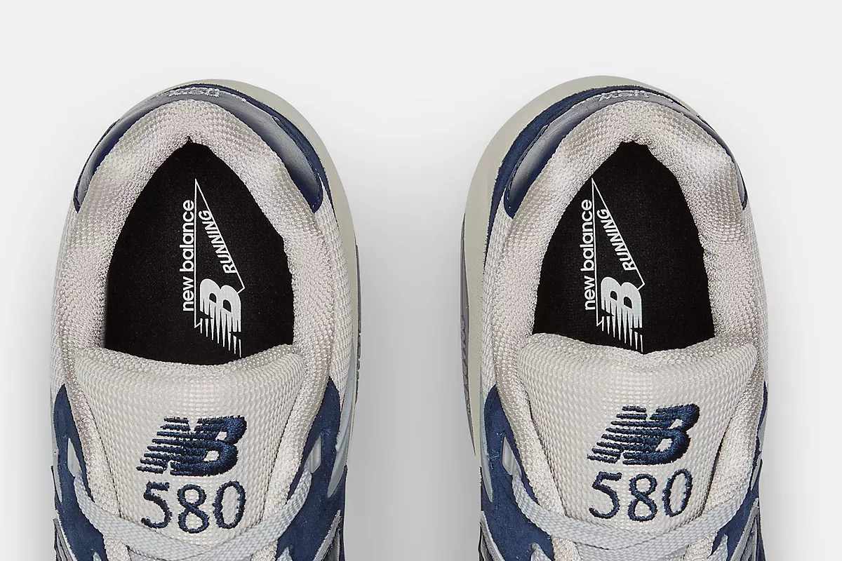 A top-down photo of New Balance's 580 sneaker in a navy colorway