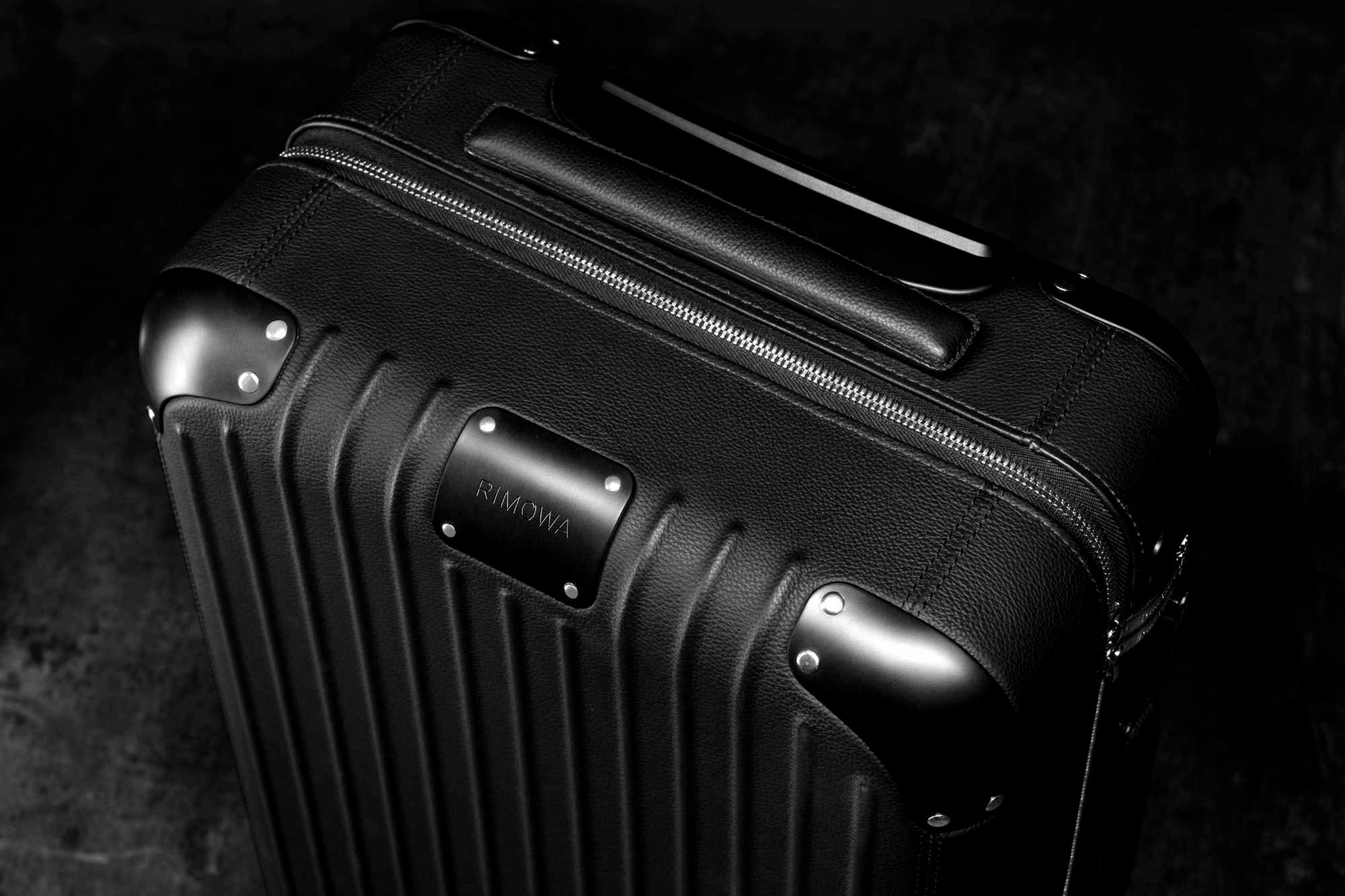 RIMOWA's $3,300 leather-wrapped Distinct Cabin suitcase collection