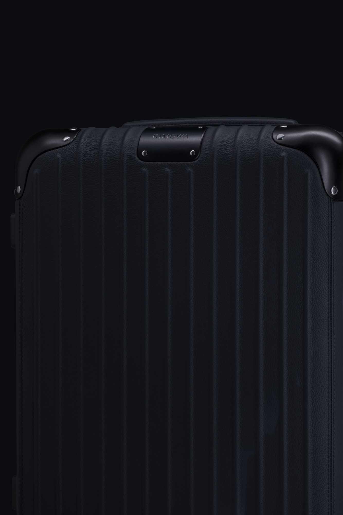RIMOWA's $3,300 leather-wrapped Distinct Cabin suitcase collection
