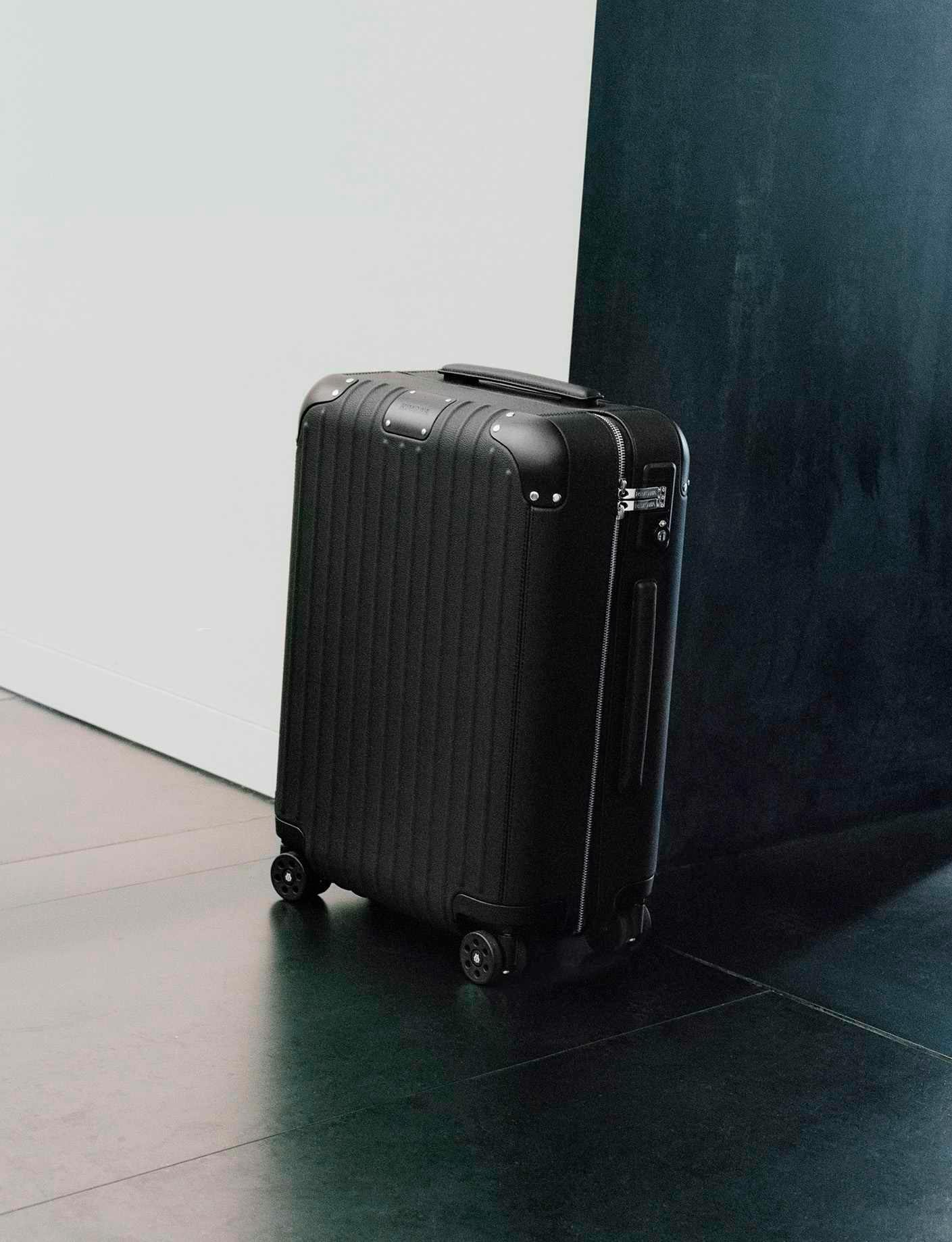 RIMOWA's $3,300 leather-wrapped Distinct Cabin suitcase collection