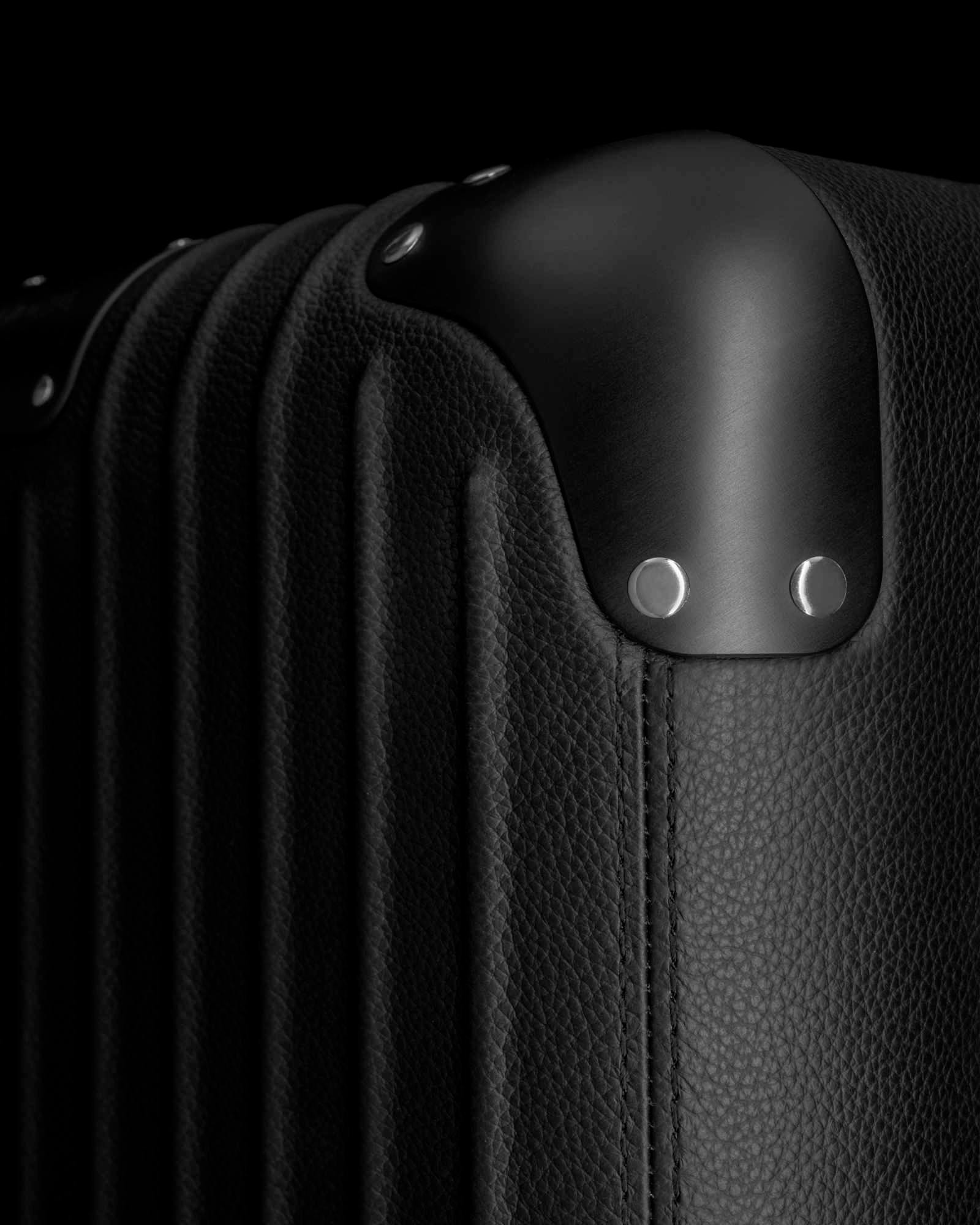 RIMOWA's $3,300 leather-wrapped Distinct Cabin suitcase collection