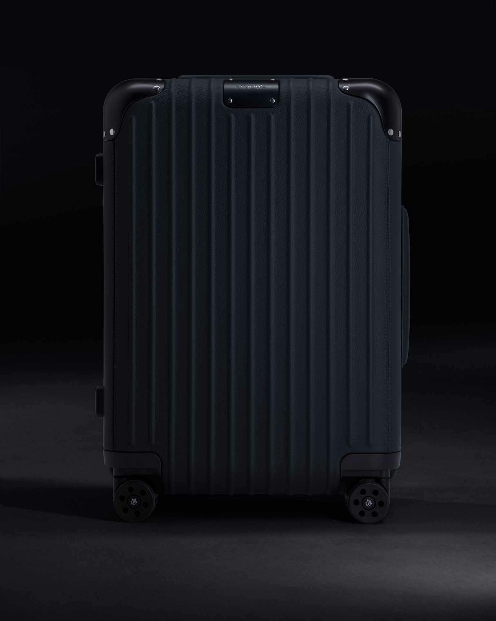 RIMOWA's $3,300 leather-wrapped Distinct Cabin suitcase collection