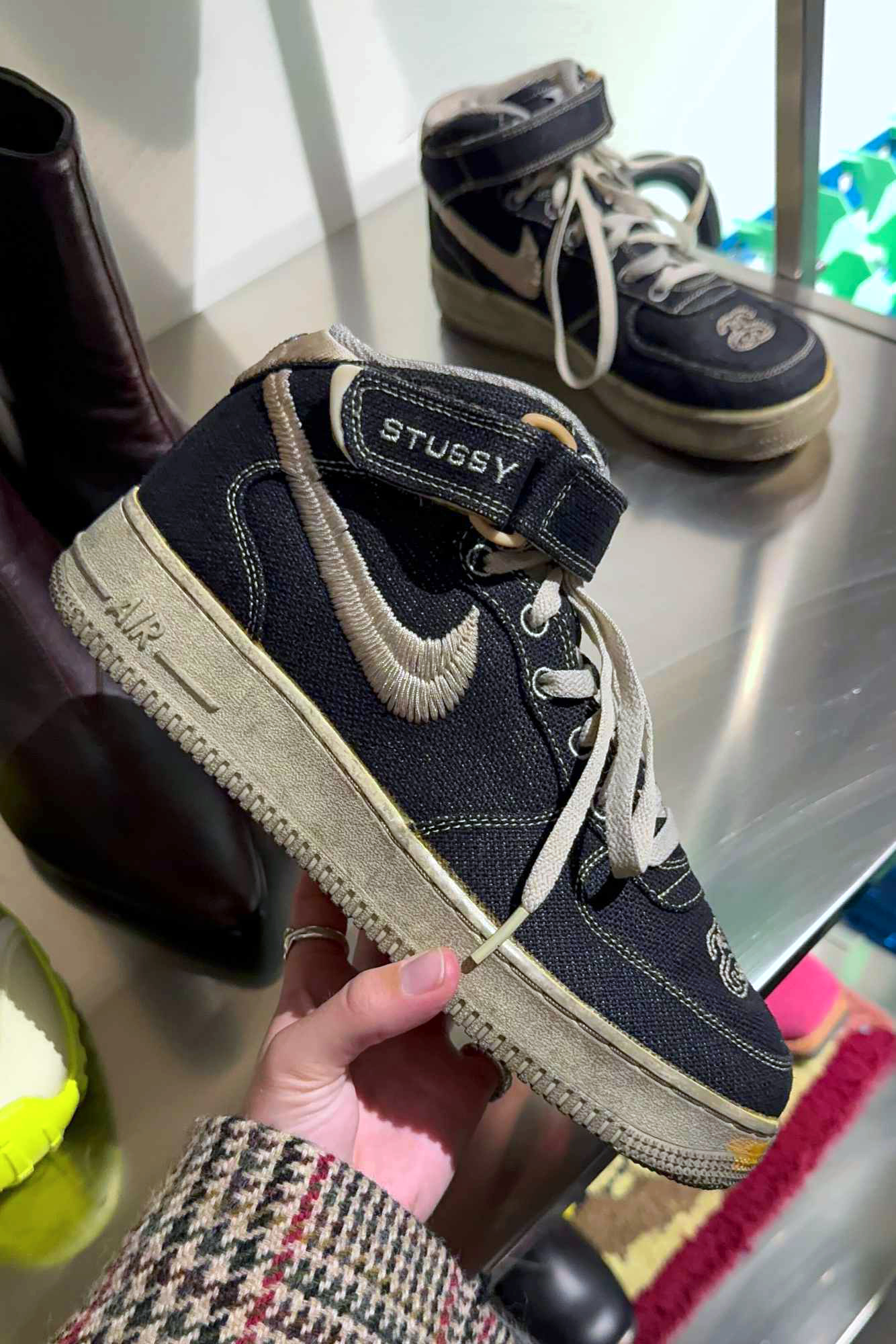 In-hand photos of Stussy & Nike's dyed Air Force 1 Mid sneaker