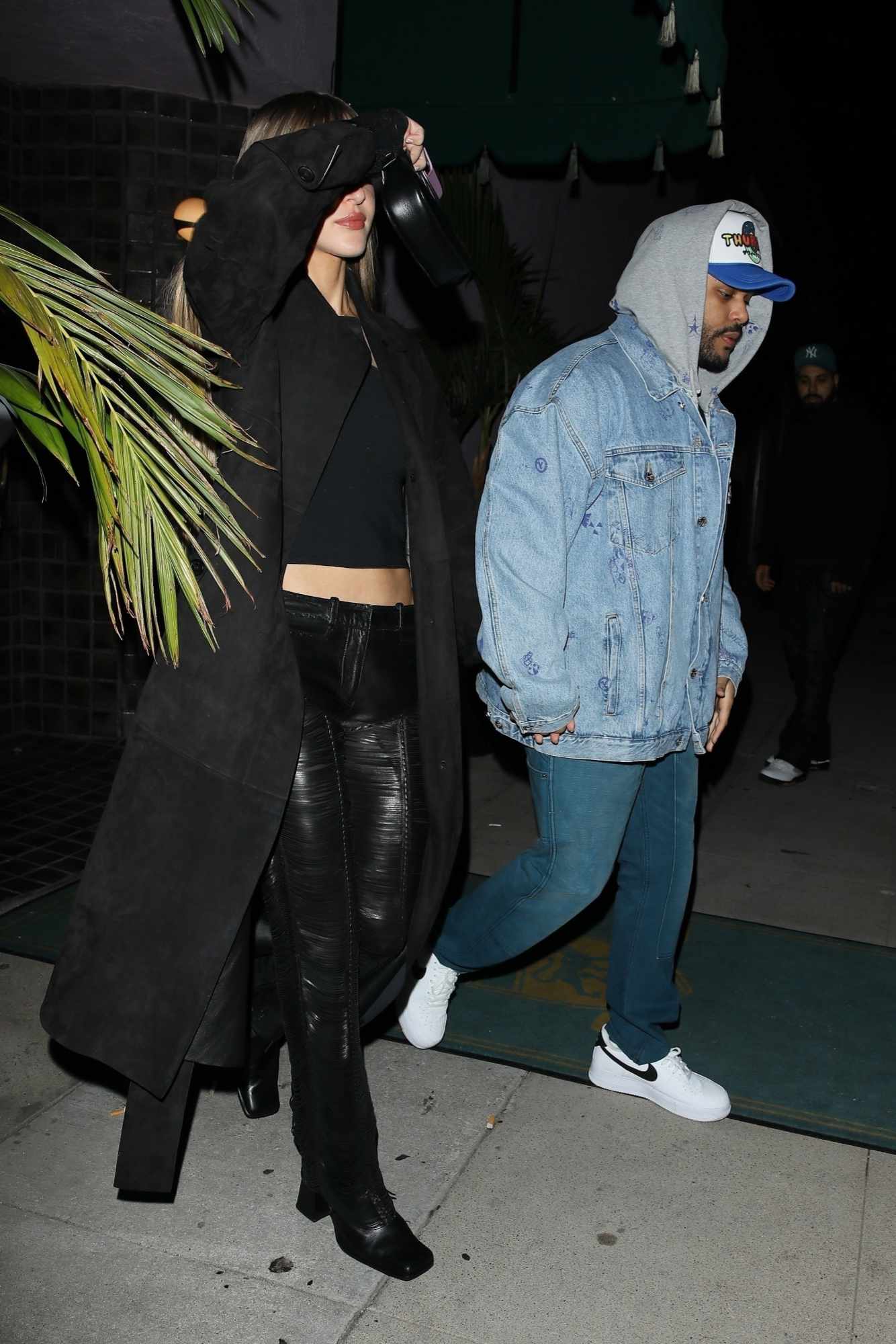 The Weeknd & Simi Khadra seen out in Beverly hills wearing a black jacket & pants and a denim jacket and jeans